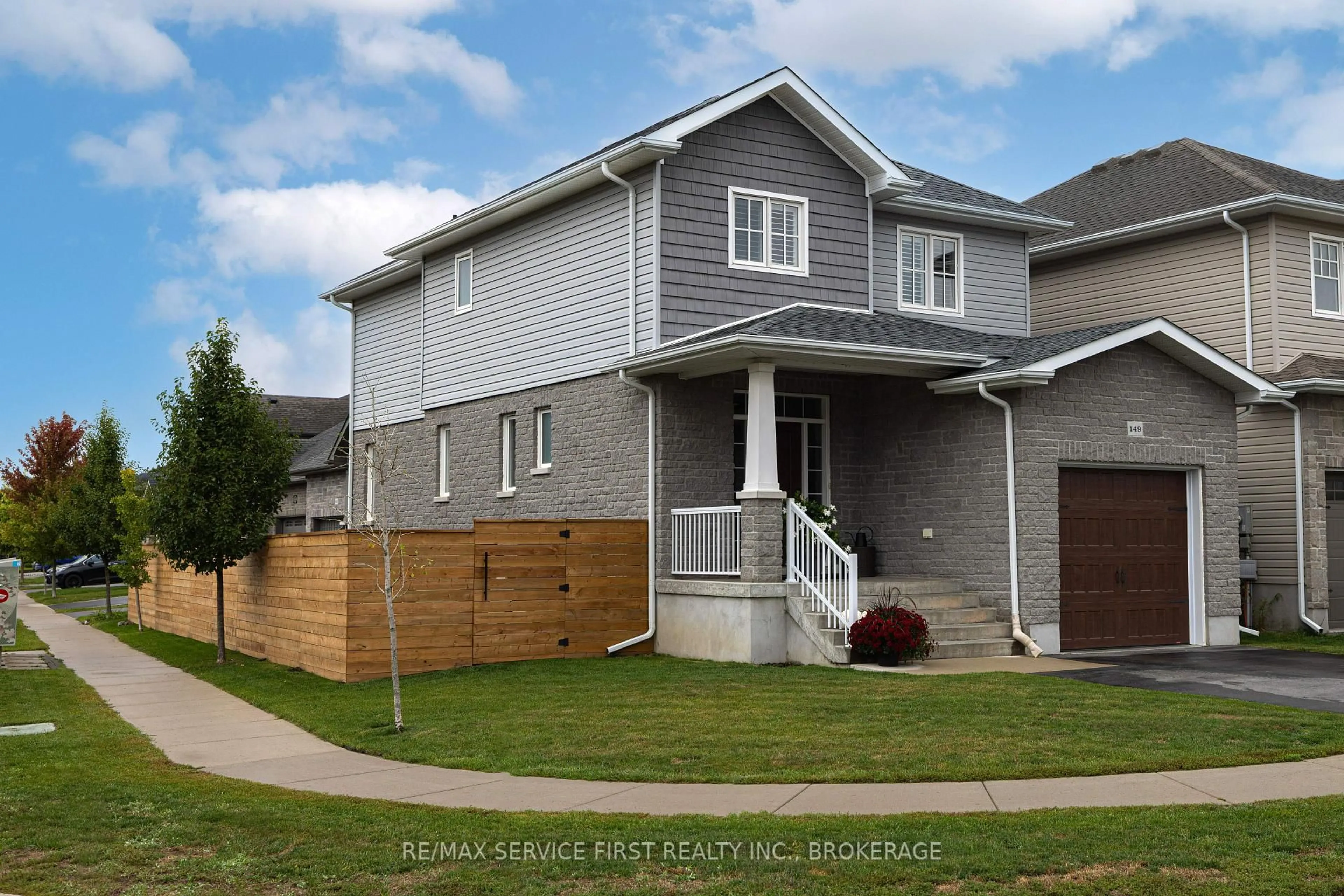 Home with vinyl exterior material, street for 149 Pauline Tom Ave, Kingston Ontario K7K 7J9