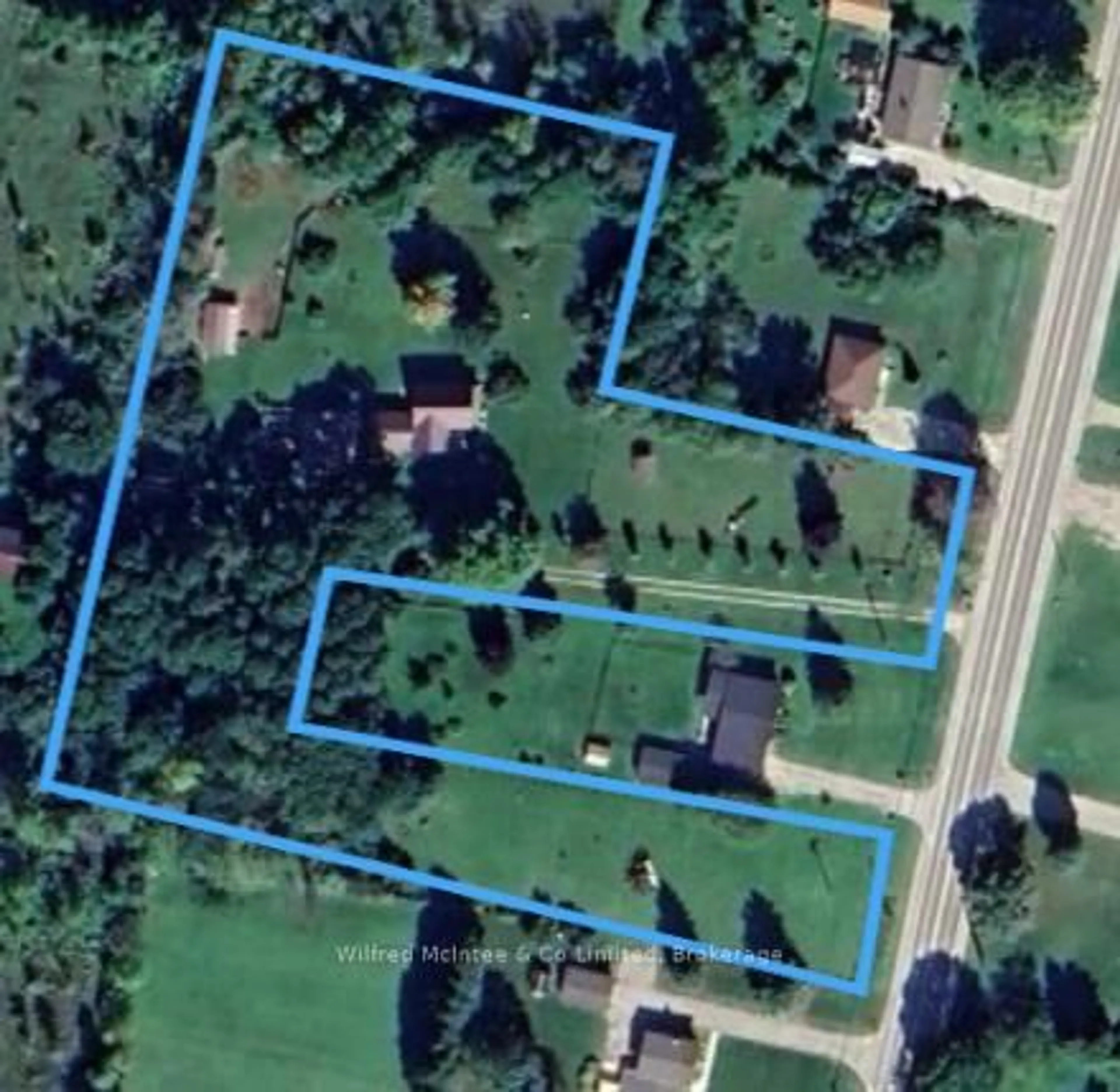 A pic from outside/outdoor area/front of a property/back of a property/a pic from drone, street for 318840 Grey Rd 1, Georgian Bluffs Ontario N4K 5N4