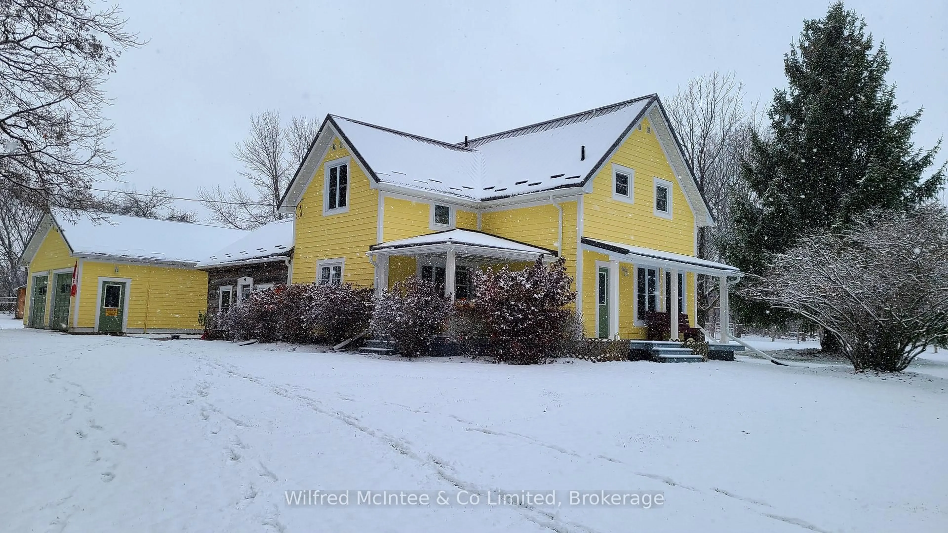 A pic from outside/outdoor area/front of a property/back of a property/a pic from drone, street for 318840 Grey Rd 1, Georgian Bluffs Ontario N4K 5N4