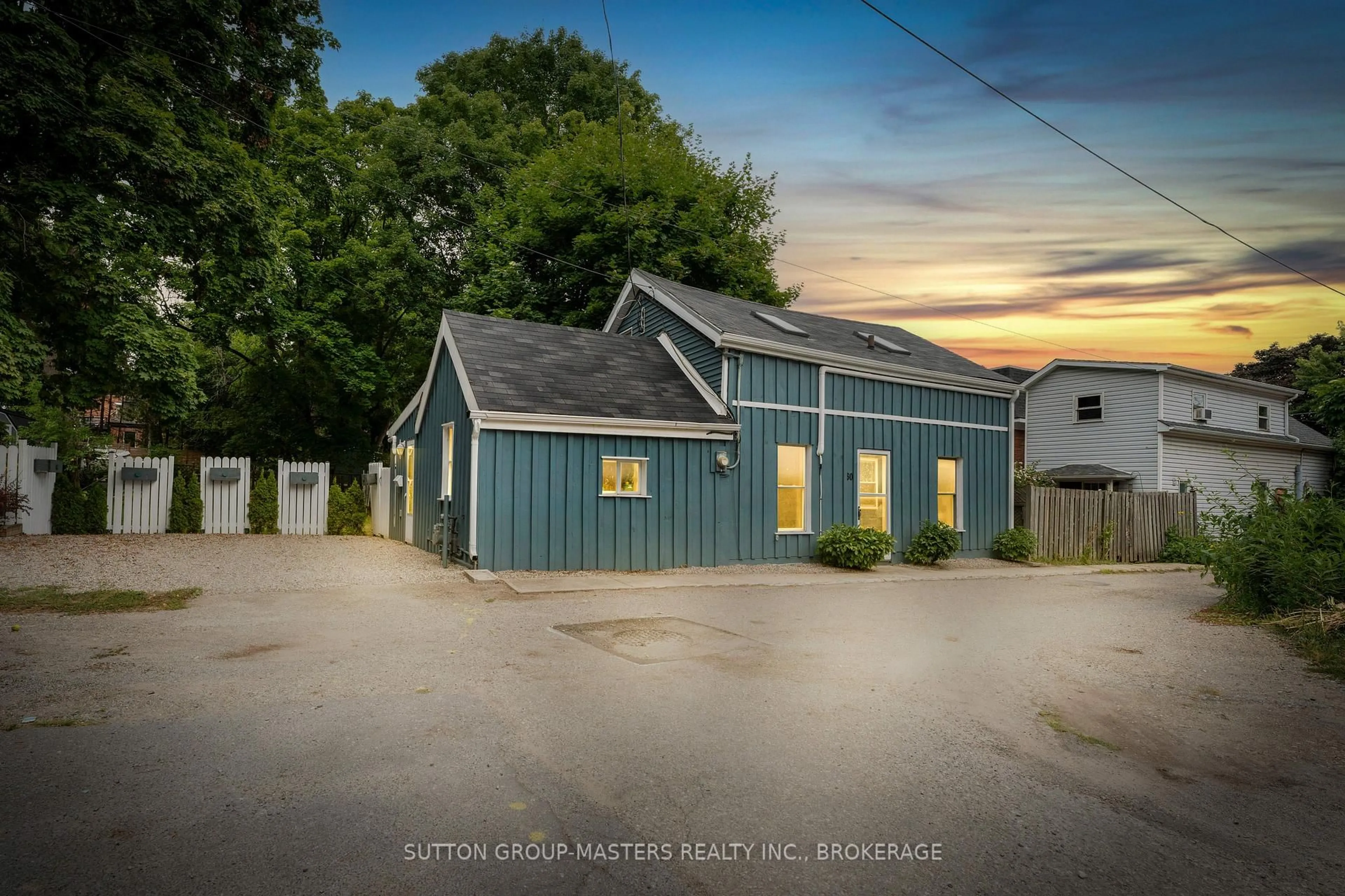 A pic from outside/outdoor area/front of a property/back of a property/a pic from drone, street for 60 Centre St, Gananoque Ontario K7G 2H7