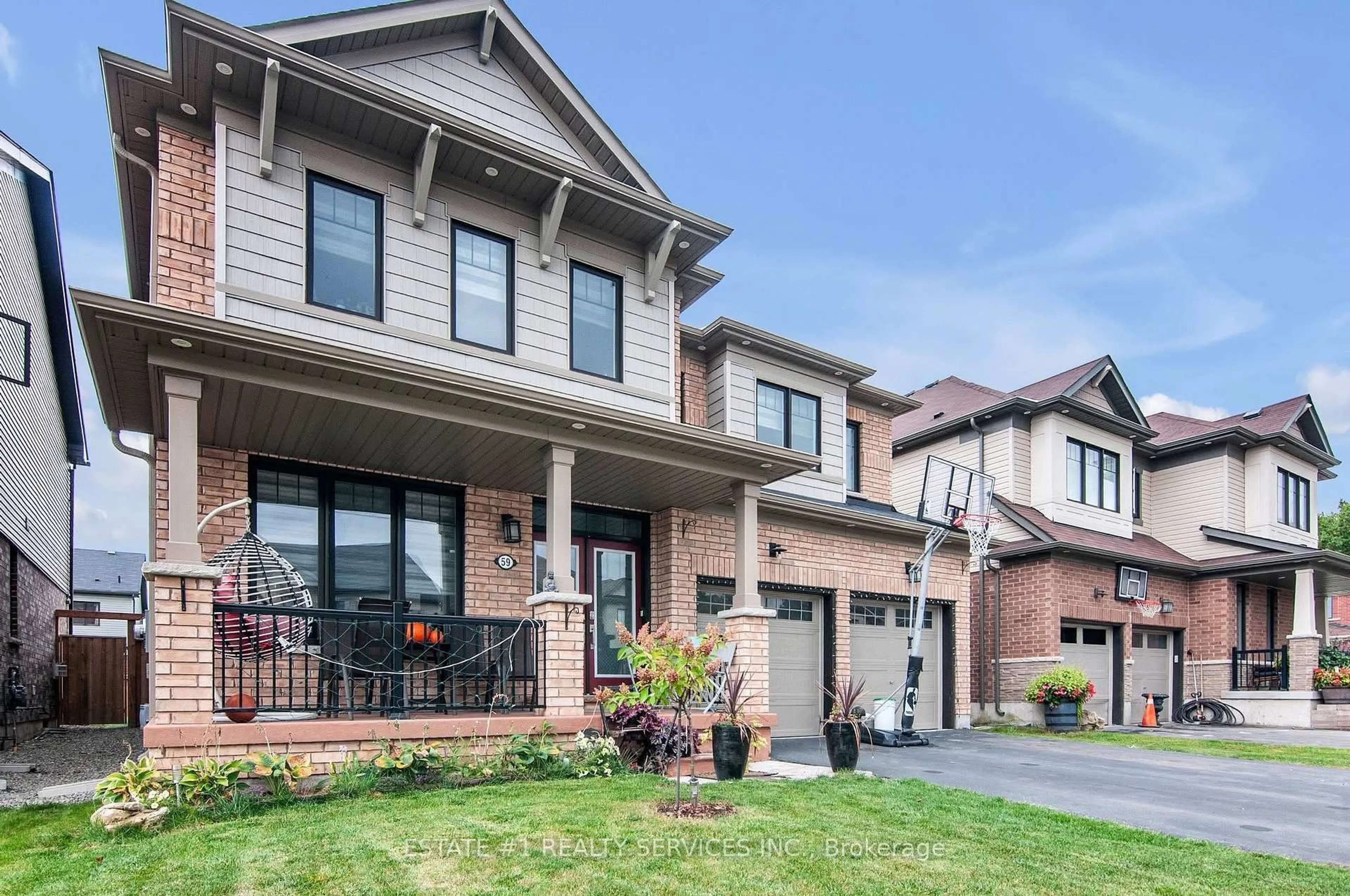 Home with brick exterior material, street for 59 July Ave, Hamilton Ontario L8J 0M4