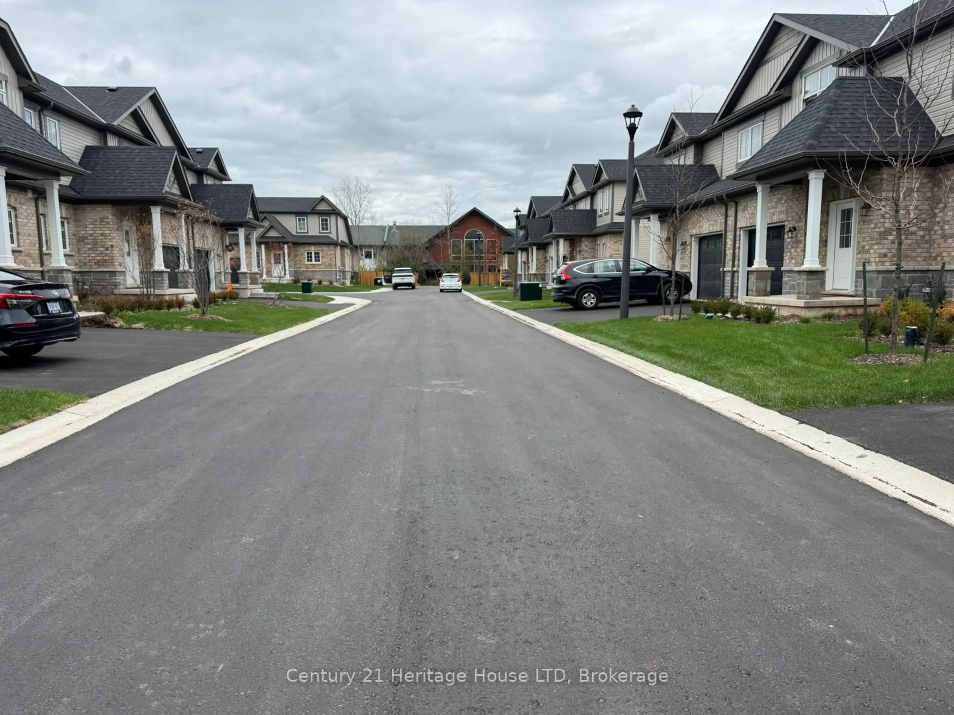 A pic from outside/outdoor area/front of a property/back of a property/a pic from drone, street for 397 Garrison Rd #18, Fort Erie Ontario L2A 1N1