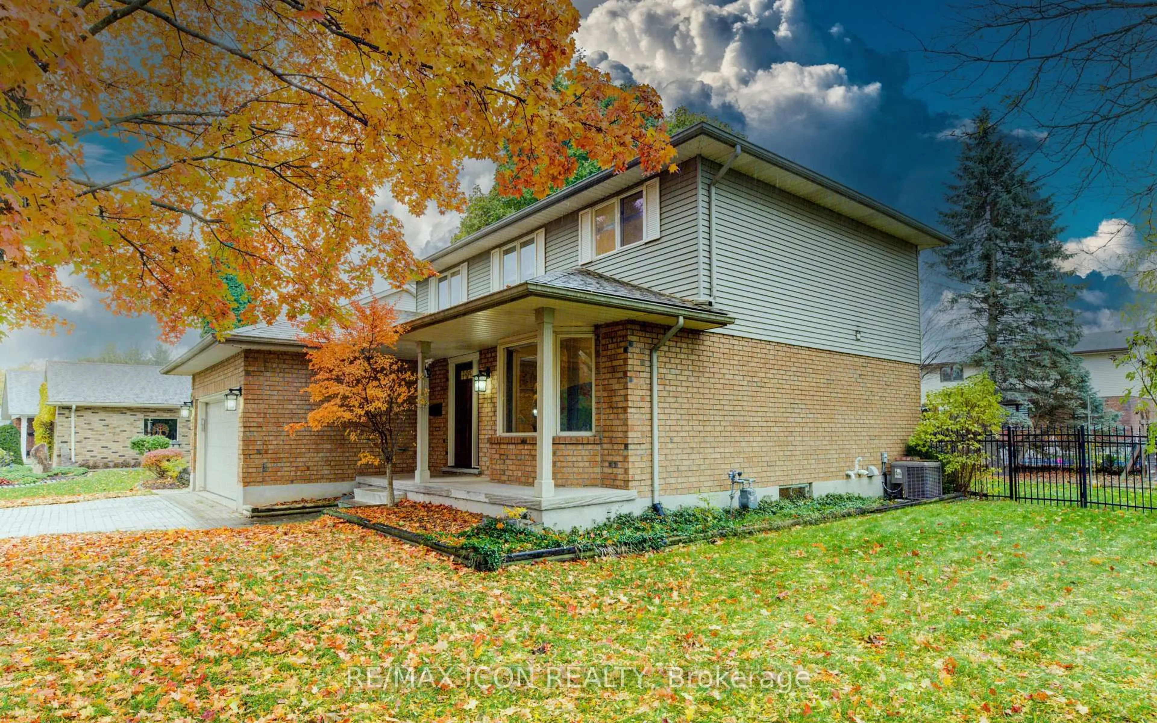 Home with brick exterior material, street for 2 Dunnington Crt, Kitchener Ontario N2A 3M5