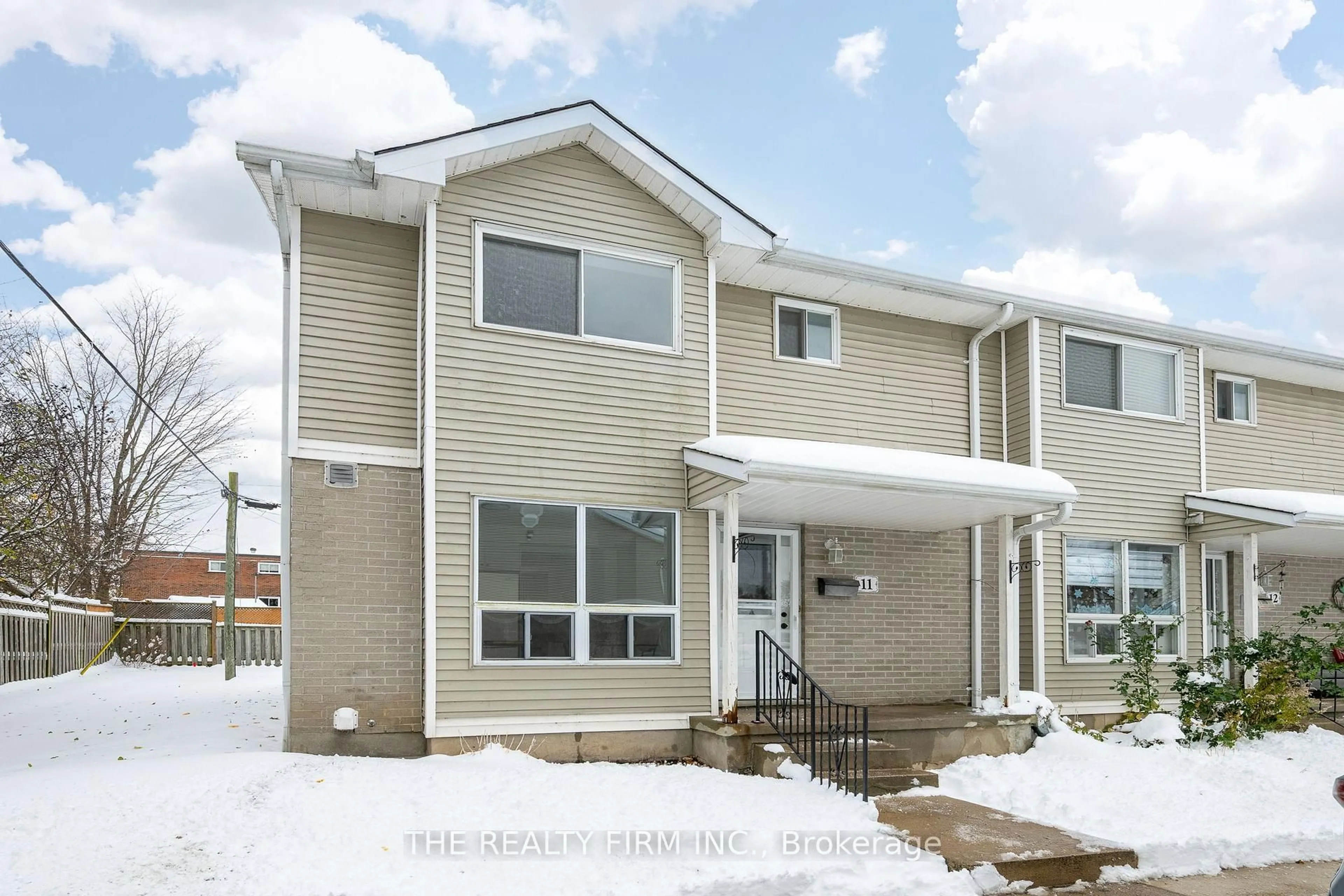 Home with vinyl exterior material, street for 409 Thompson Rd #11, London South Ontario N5Z 4Z1