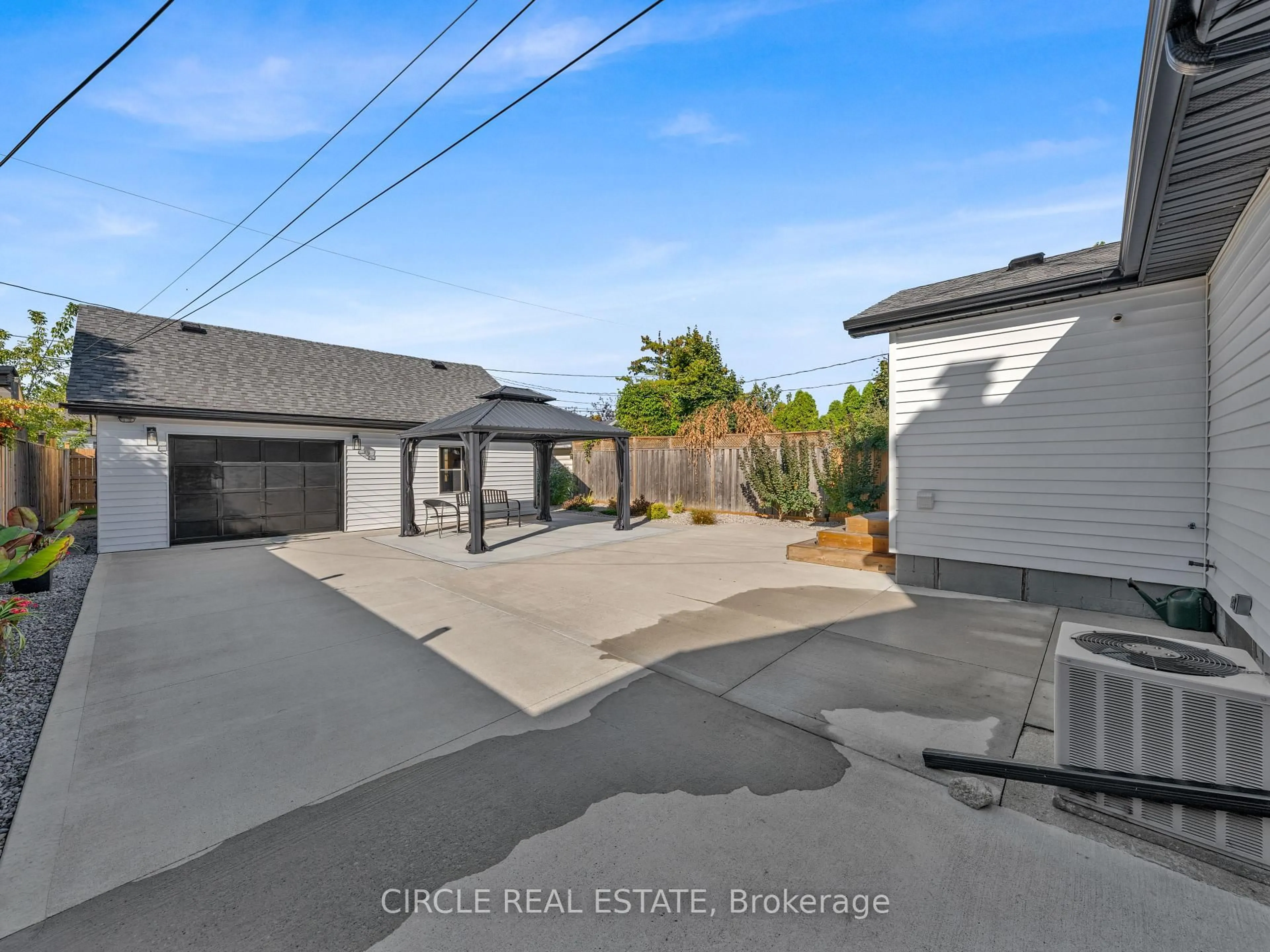 A pic from outside/outdoor area/front of a property/back of a property/a pic from drone, street for 2243 Elsmere Ave, Windsor Ontario N8W 2C7