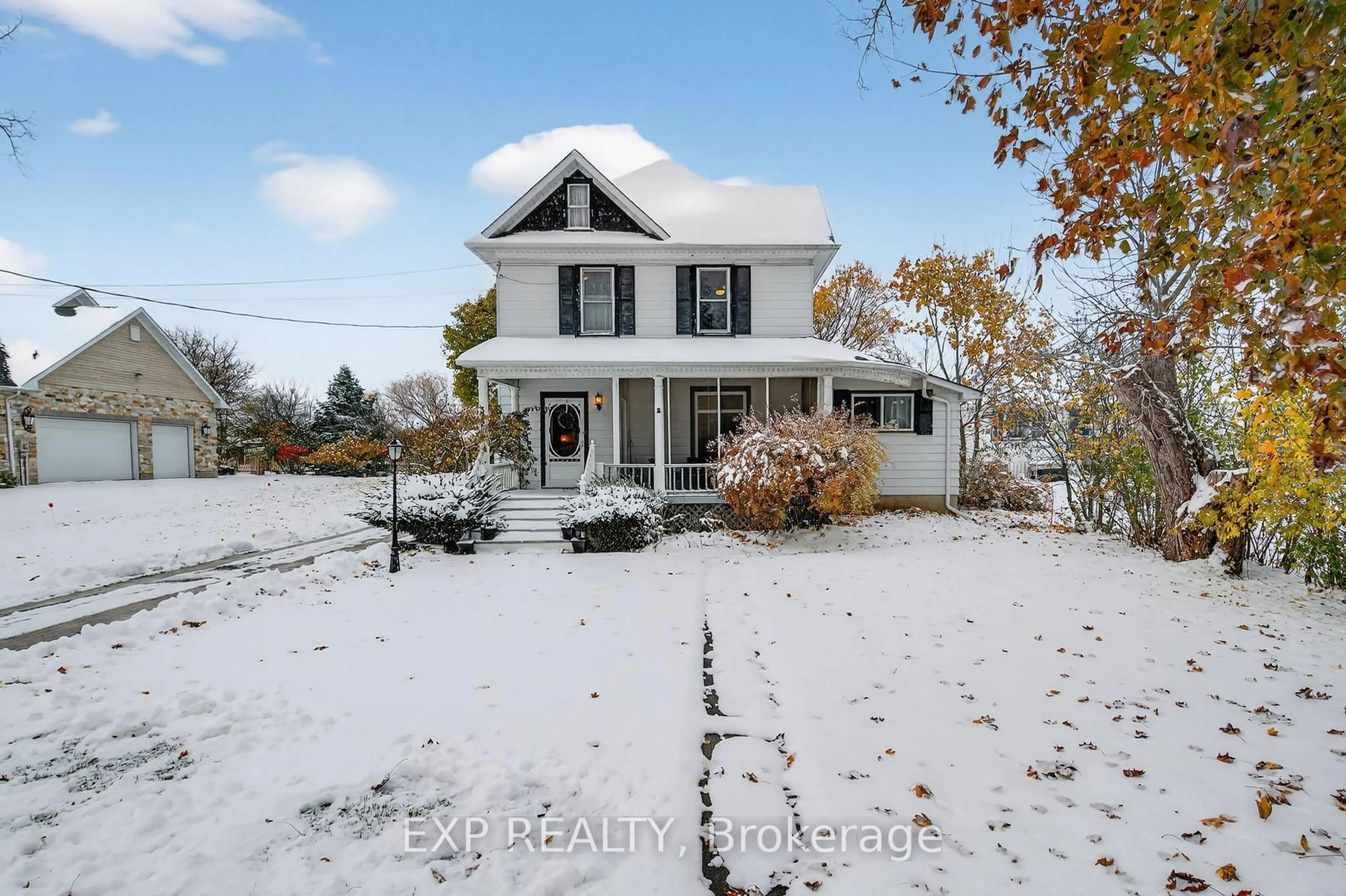 A pic from outside/outdoor area/front of a property/back of a property/a pic from drone, unknown for 372 Main St, Prince Edward County Ontario K0K 3L0