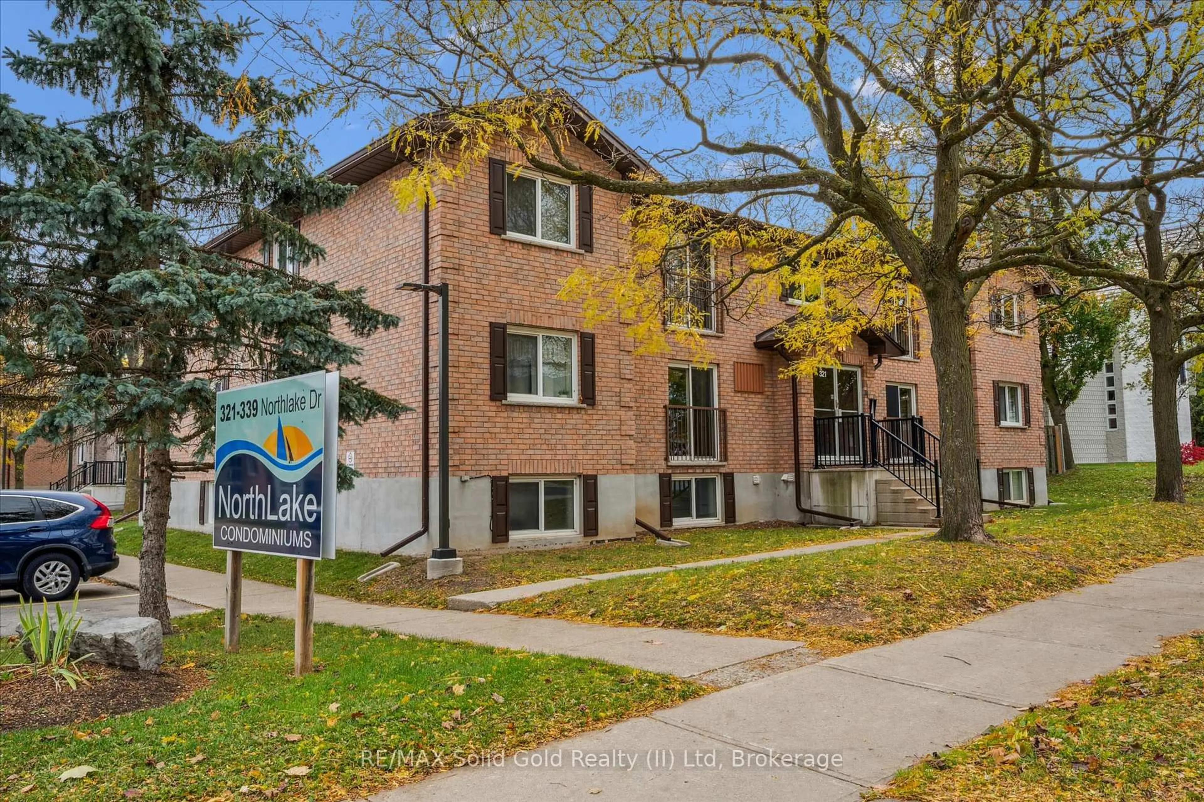 Home with brick exterior material, street for 321 Northlake Dr #6, Waterloo Ontario N2V 1Z1