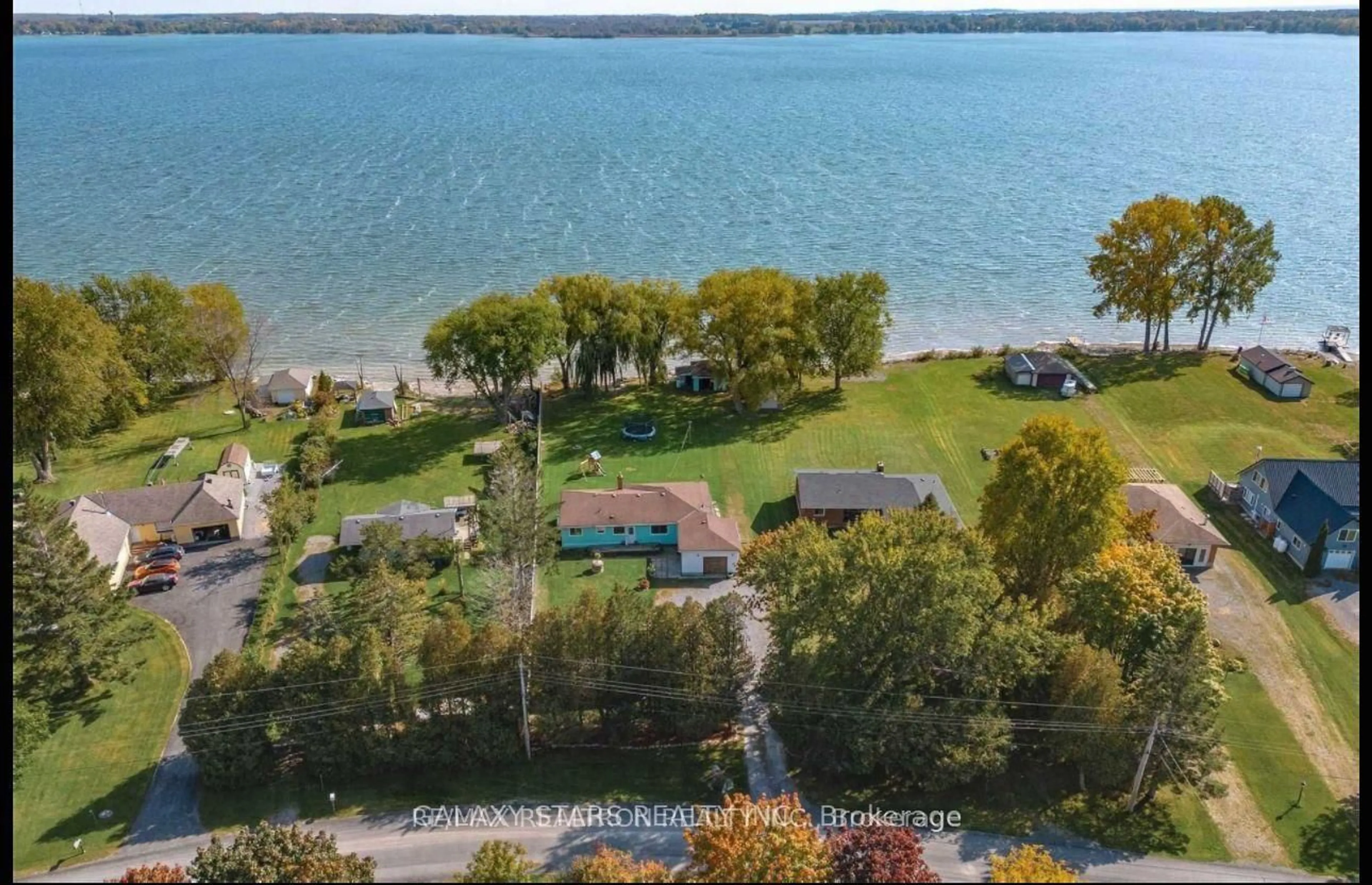 A pic from outside/outdoor area/front of a property/back of a property/a pic from drone, water/lake/river/ocean view for 514 Hiscock Shores Rd, Prince Edward County Ontario K0K 1L0