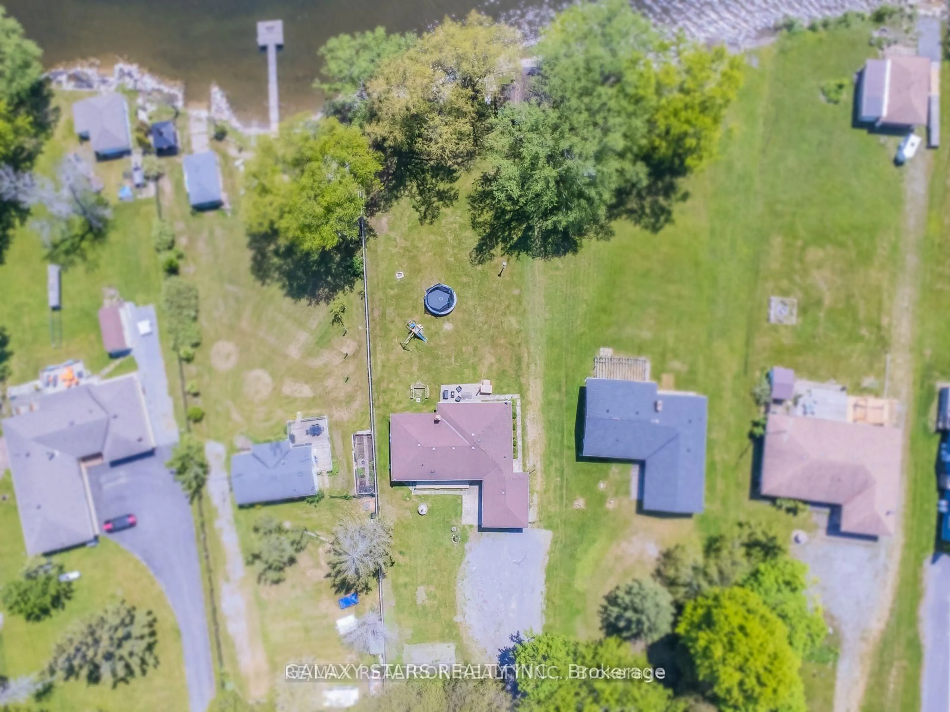 A pic from outside/outdoor area/front of a property/back of a property/a pic from drone, water/lake/river/ocean view for 514 Hiscock Shores Rd, Prince Edward County Ontario K0K 1L0