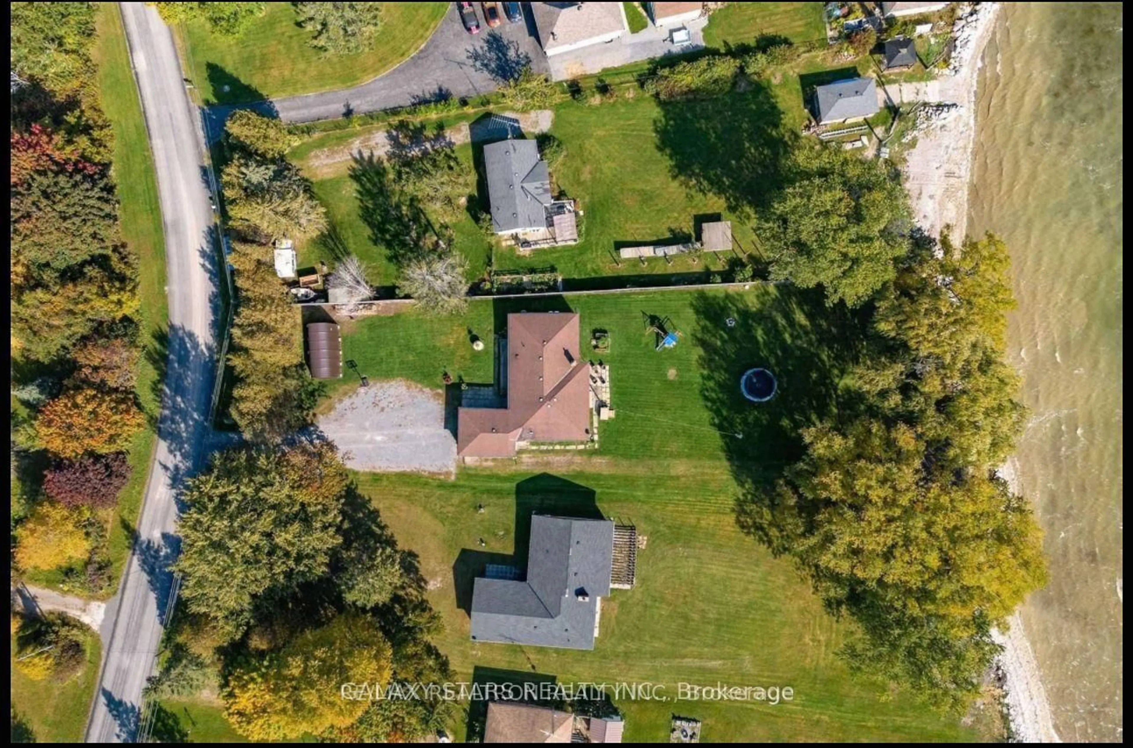 A pic from outside/outdoor area/front of a property/back of a property/a pic from drone, street for 514 Hiscock Shores Rd, Prince Edward County Ontario K0K 1L0