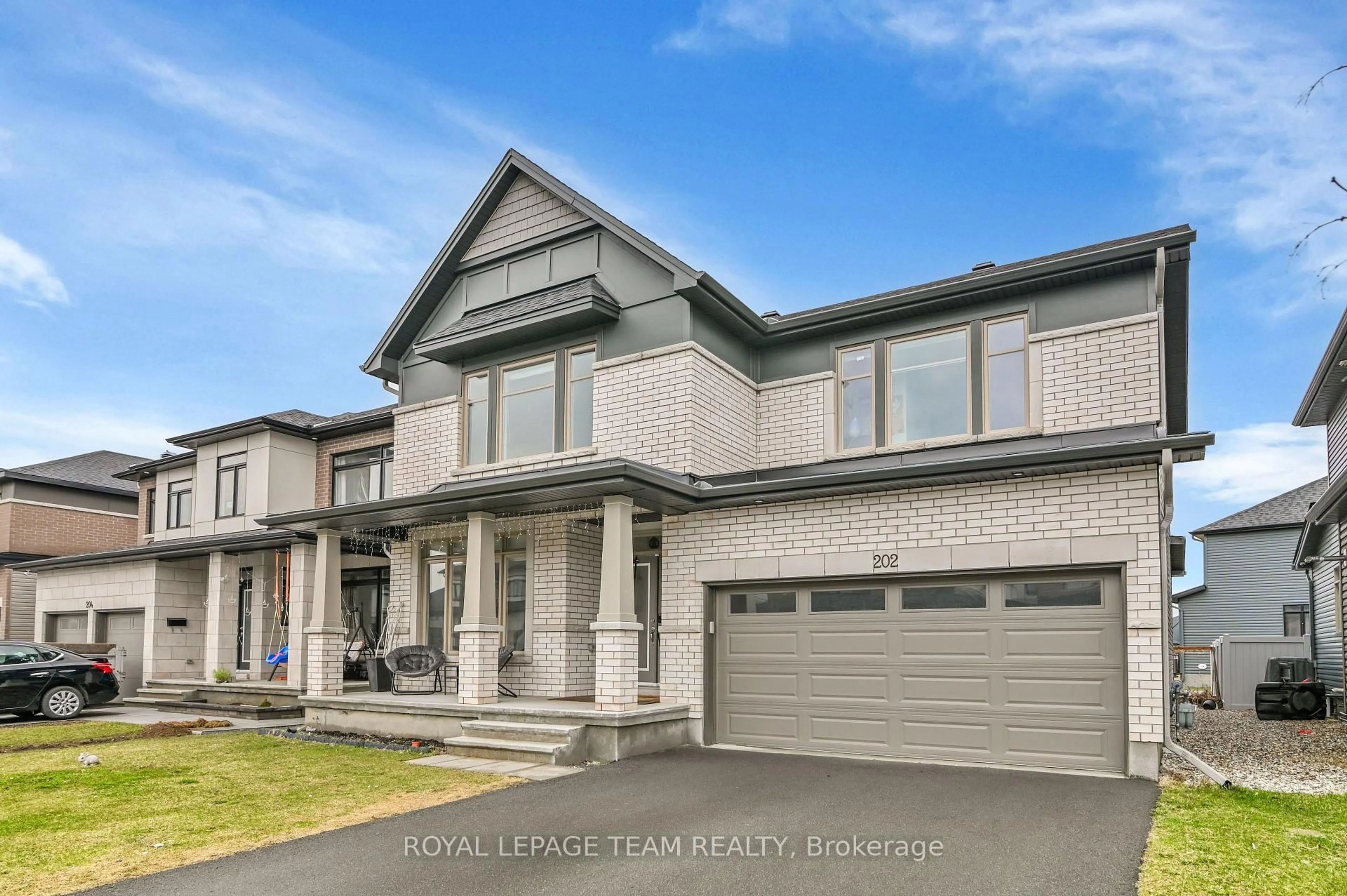 Home with brick exterior material, street for 202 Zinnia Way, Manotick Ontario K4M 0L4