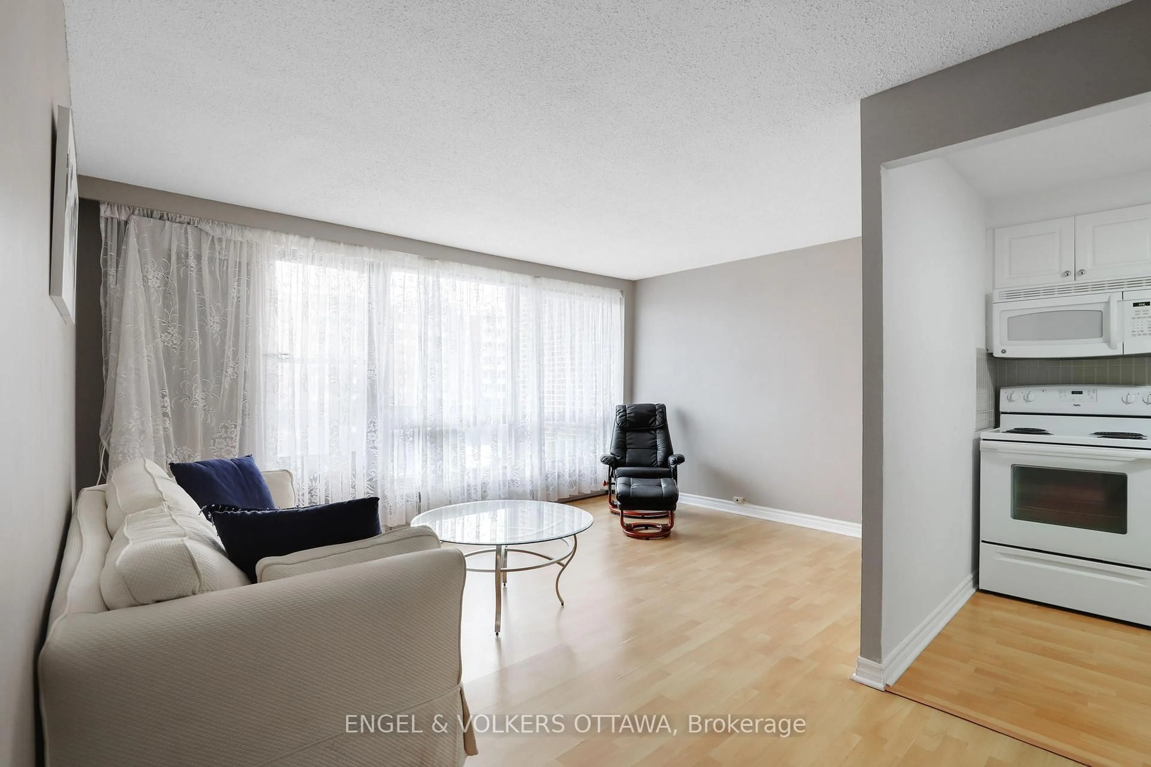 Living room with furniture, unknown for 3100 Carling Ave #814, Ottawa Ontario K2B 6J6