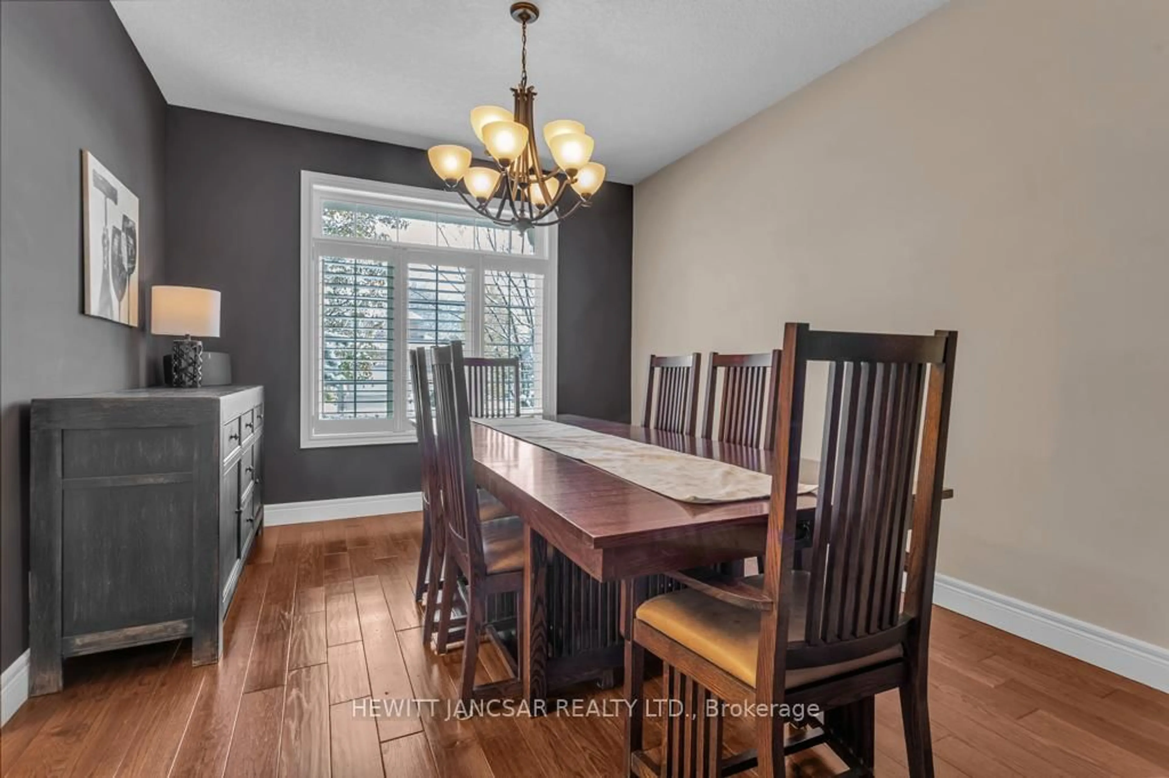 Dining room, wood/laminate floor for 211 Terrace Wood Cres, Kitchener Ontario N2P 2T3