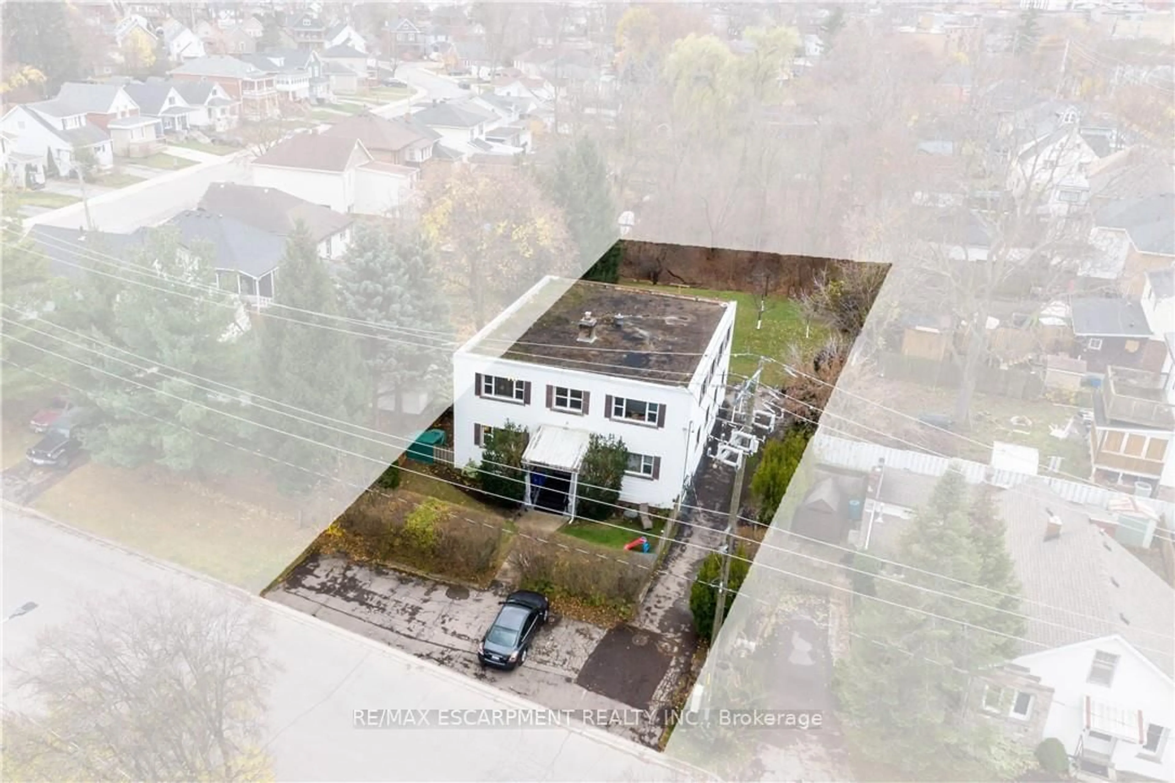 A pic from outside/outdoor area/front of a property/back of a property/a pic from drone, building for 13 McMaster Ave, Welland Ontario L3B 3S6