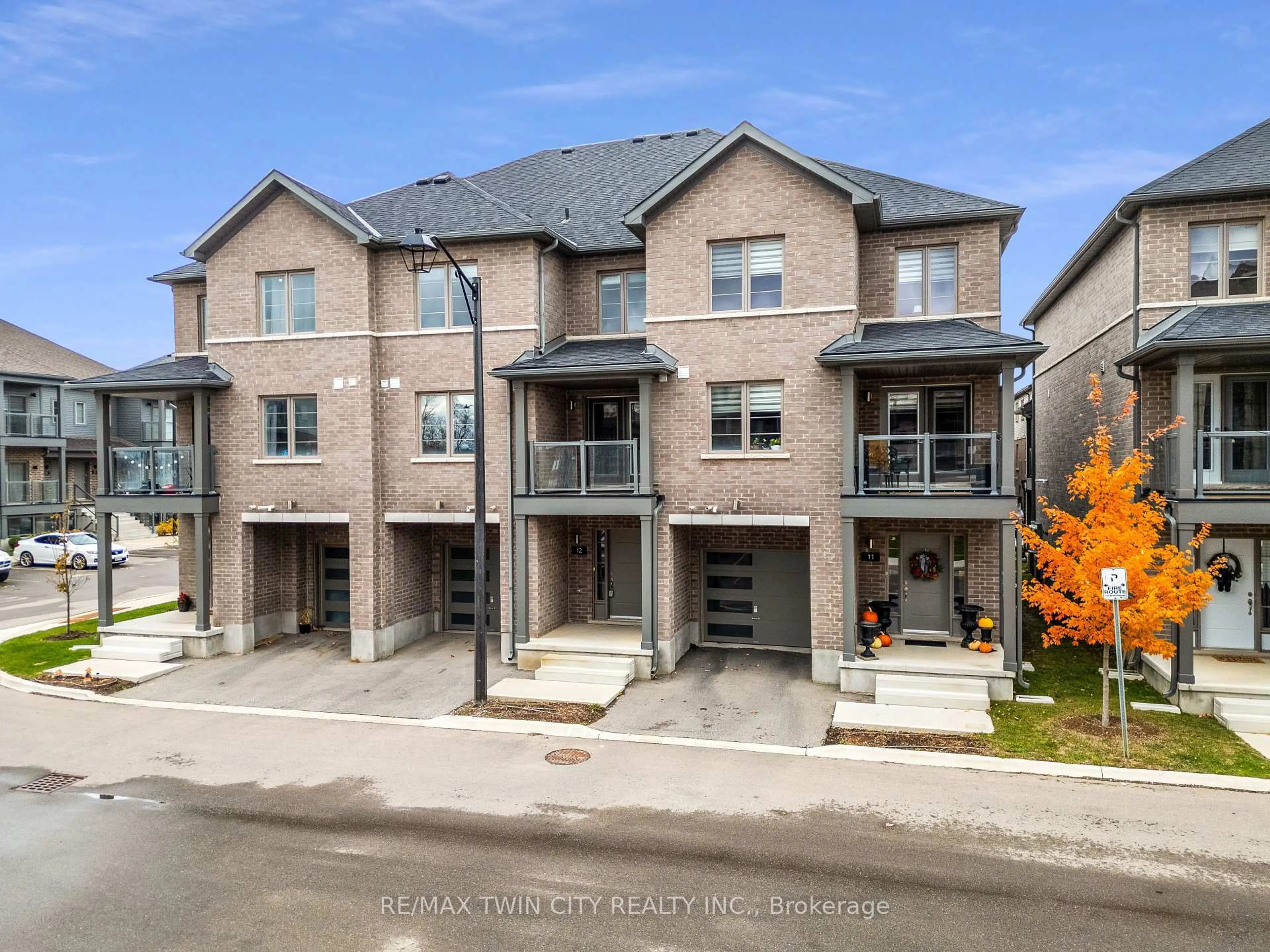 A pic from outside/outdoor area/front of a property/back of a property/a pic from drone, street for 205 West Oak Tr #12, Kitchener Ontario N2R 0R9