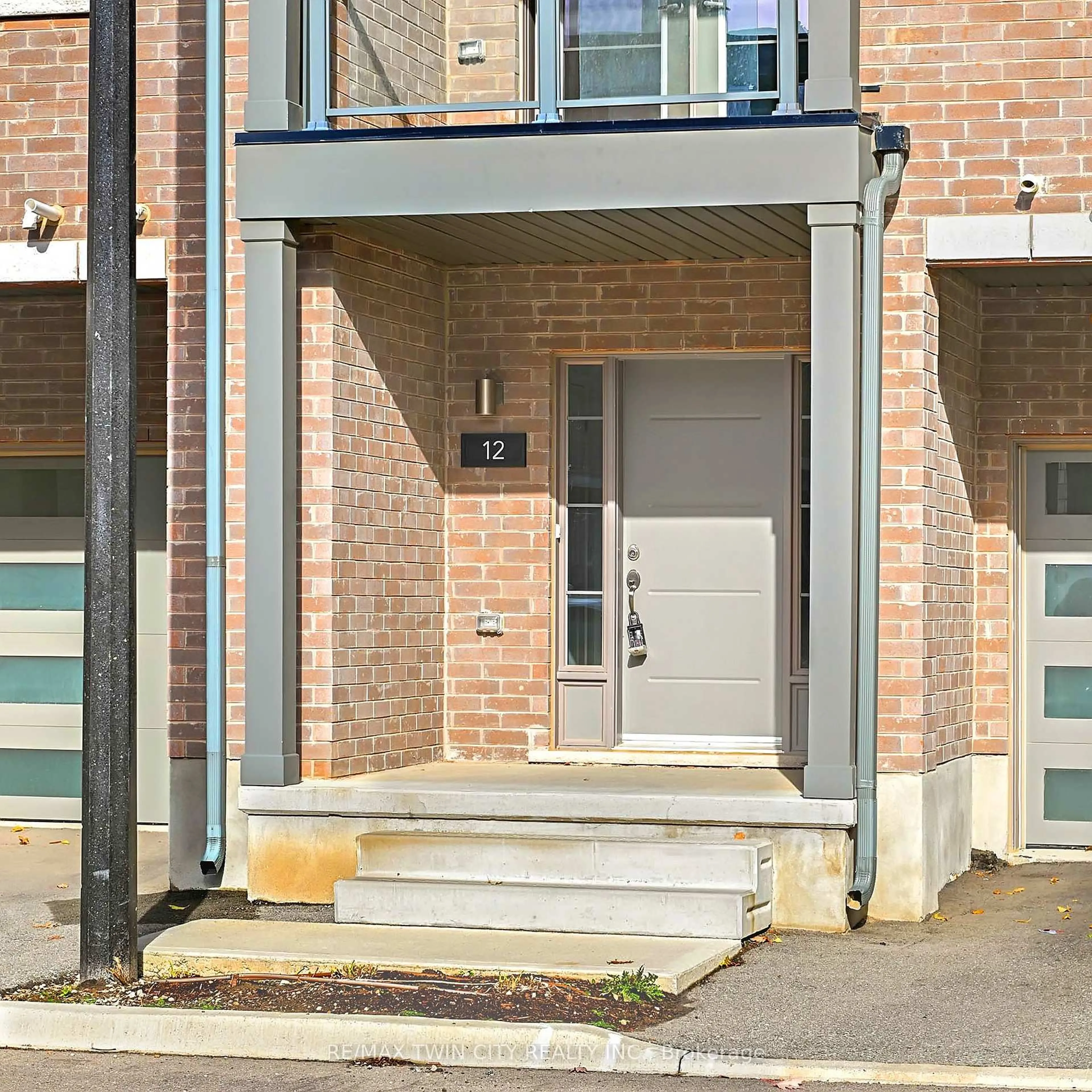 Home with brick exterior material, street for 205 West Oak Tr #12, Kitchener Ontario N2R 0R9