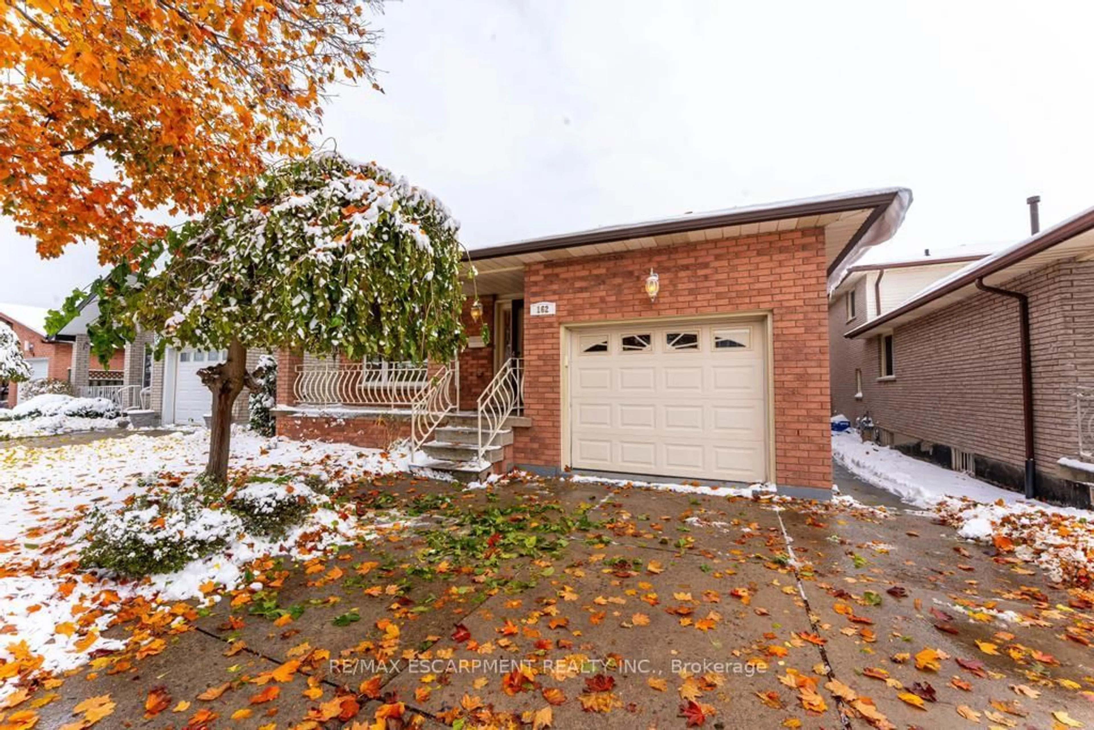 Home with brick exterior material, street for 162 SOLOMON Cres, Hamilton Ontario L8W 2G7
