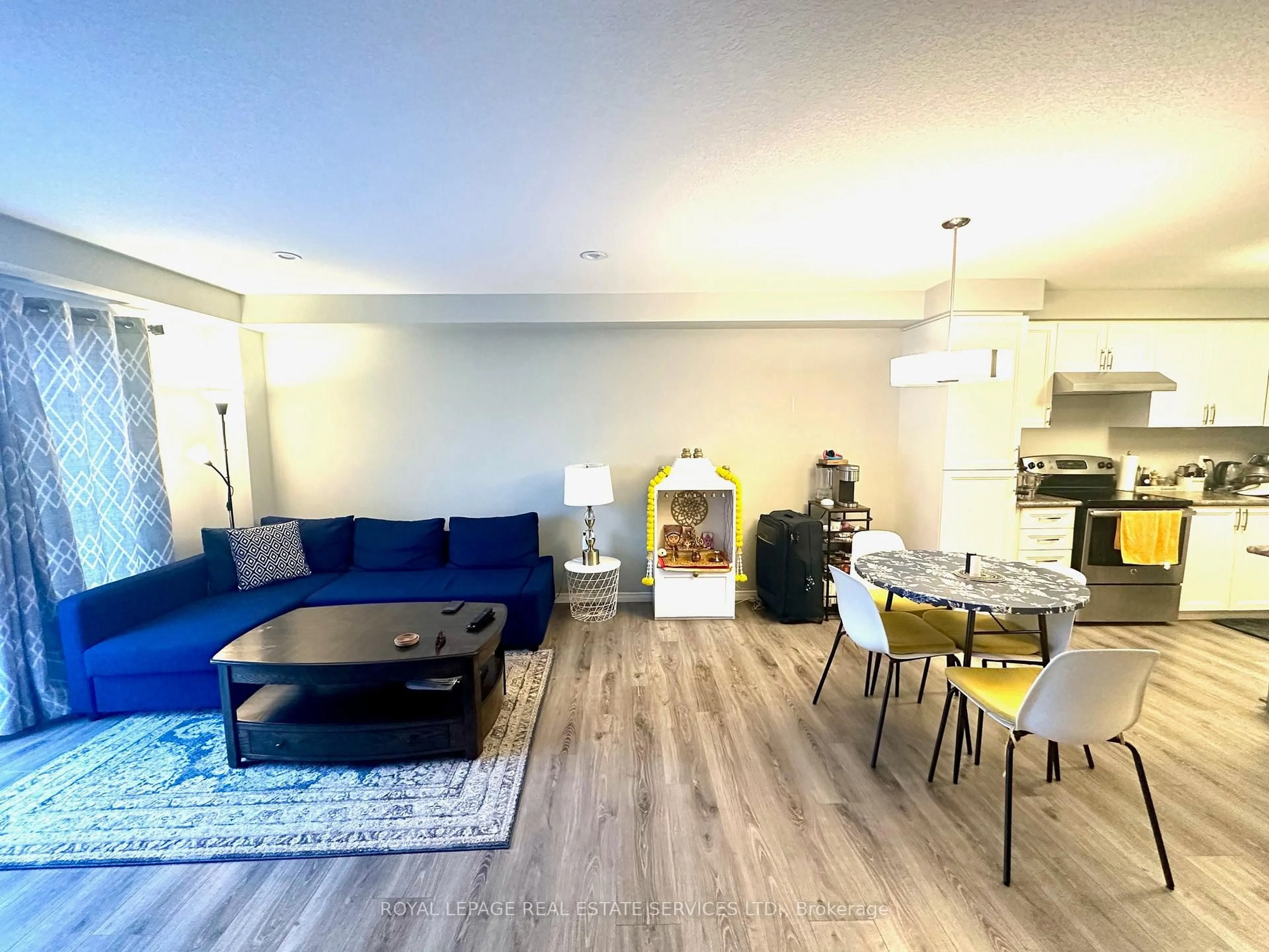 Living room with furniture, wood/laminate floor for 60 Netherwood Rd, Kitchener Ontario L2P 0E4