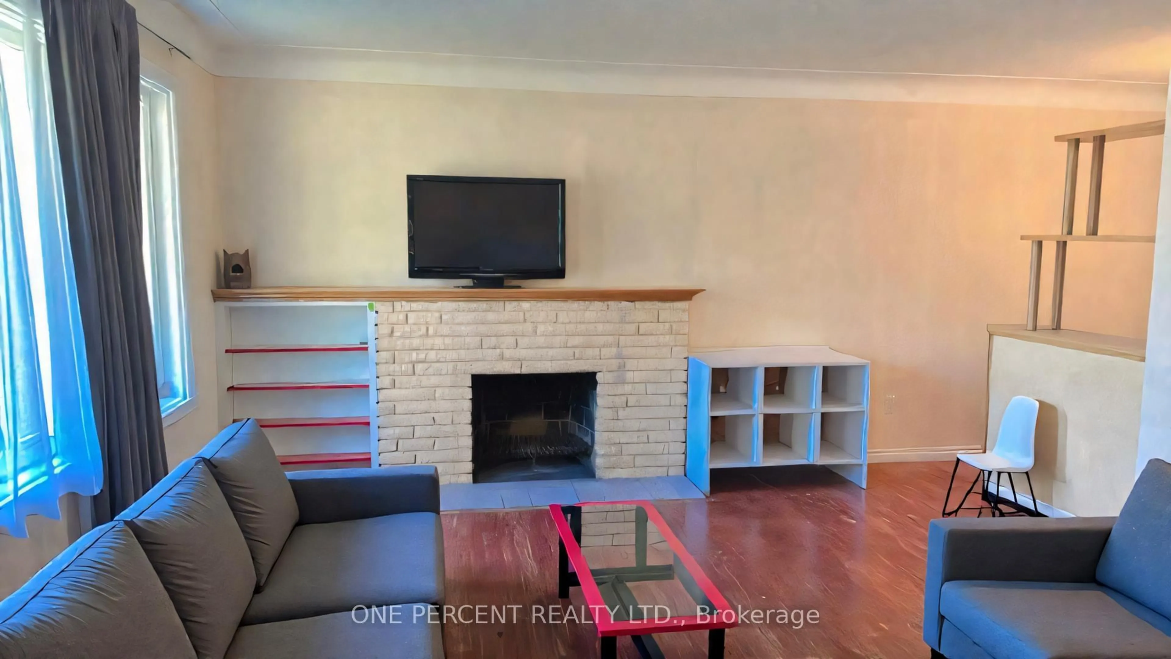 Living room with furniture, wood/laminate floor for 1200 Huron St, London East Ontario N5Y 4K9