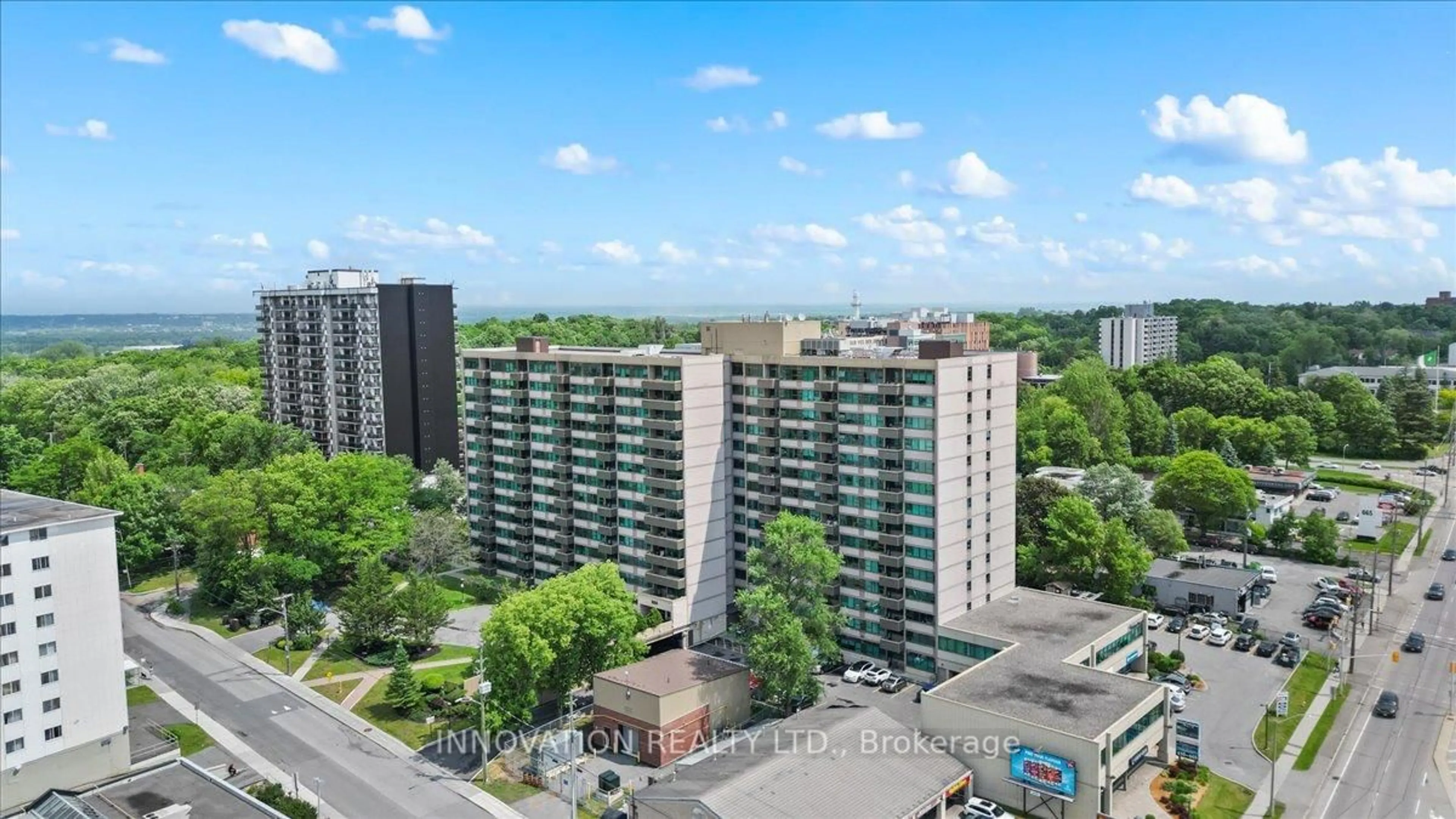 A pic from outside/outdoor area/front of a property/back of a property/a pic from drone, city buildings view from balcony for 555 Brittany Dr #610, Ottawa Ontario K1K 4C5