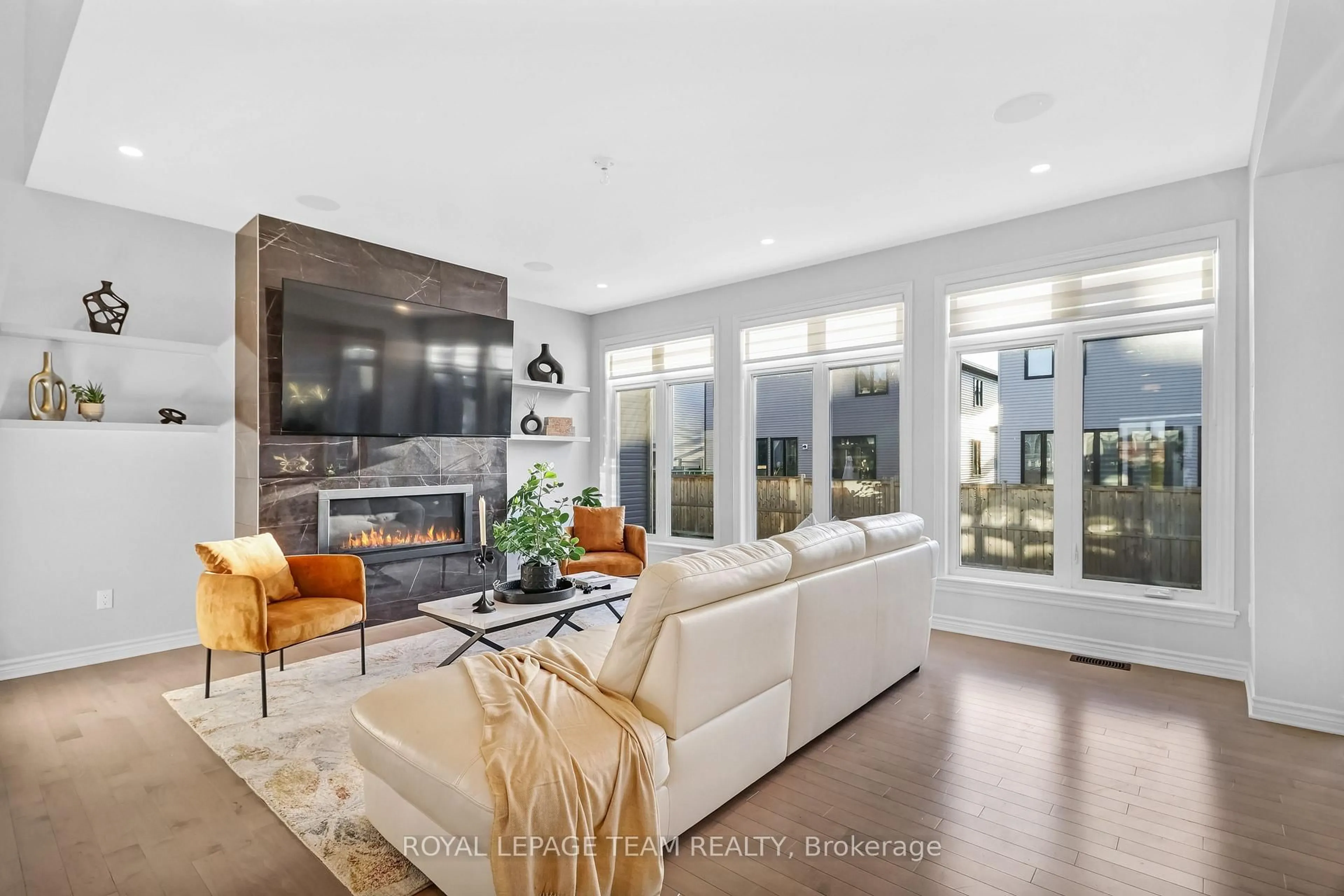 Living room with furniture, unknown for 711 Moonflower Cres, Ottawa Ontario K1T 0X8