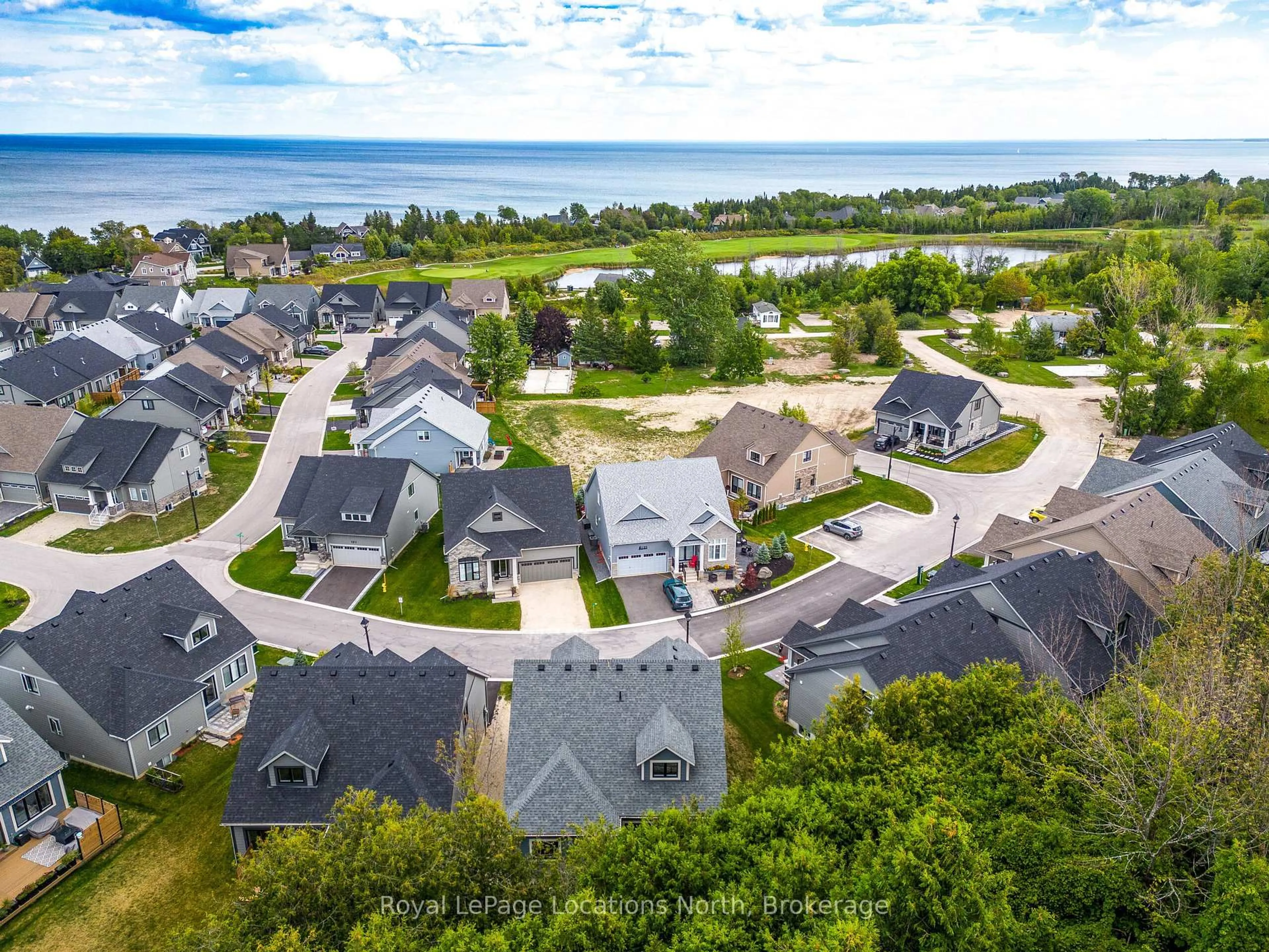 A pic from outside/outdoor area/front of a property/back of a property/a pic from drone, water/lake/river/ocean view for 124 Beacon Dr, Blue Mountains Ontario N0H 2P0