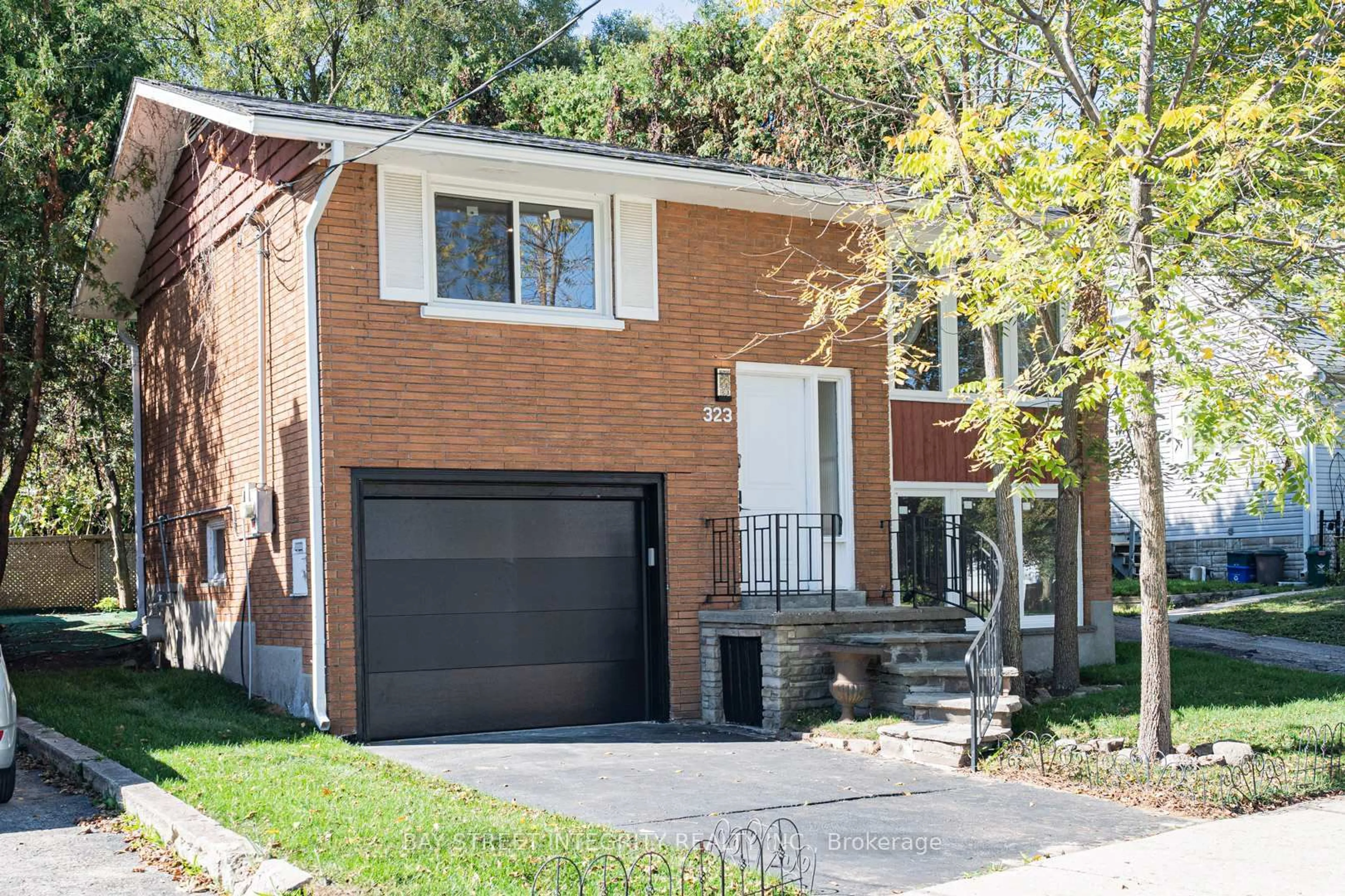 Home with brick exterior material, street for 323 Clifton Rd, Kitchener Ontario N2H 4W1