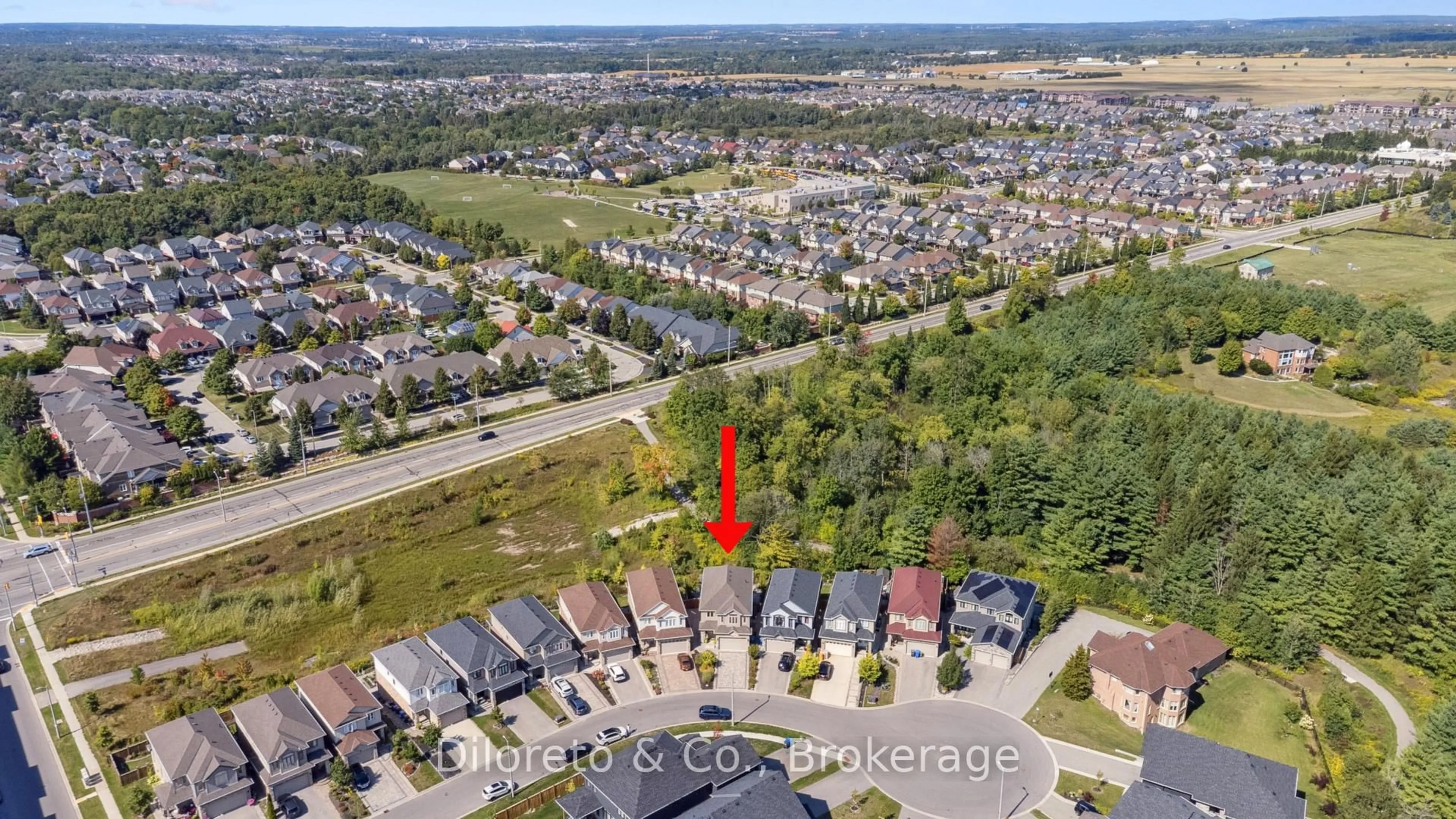 A pic from outside/outdoor area/front of a property/back of a property/a pic from drone, unknown for 18 McIntyre Crt, Guelph Ontario N1L 0N1