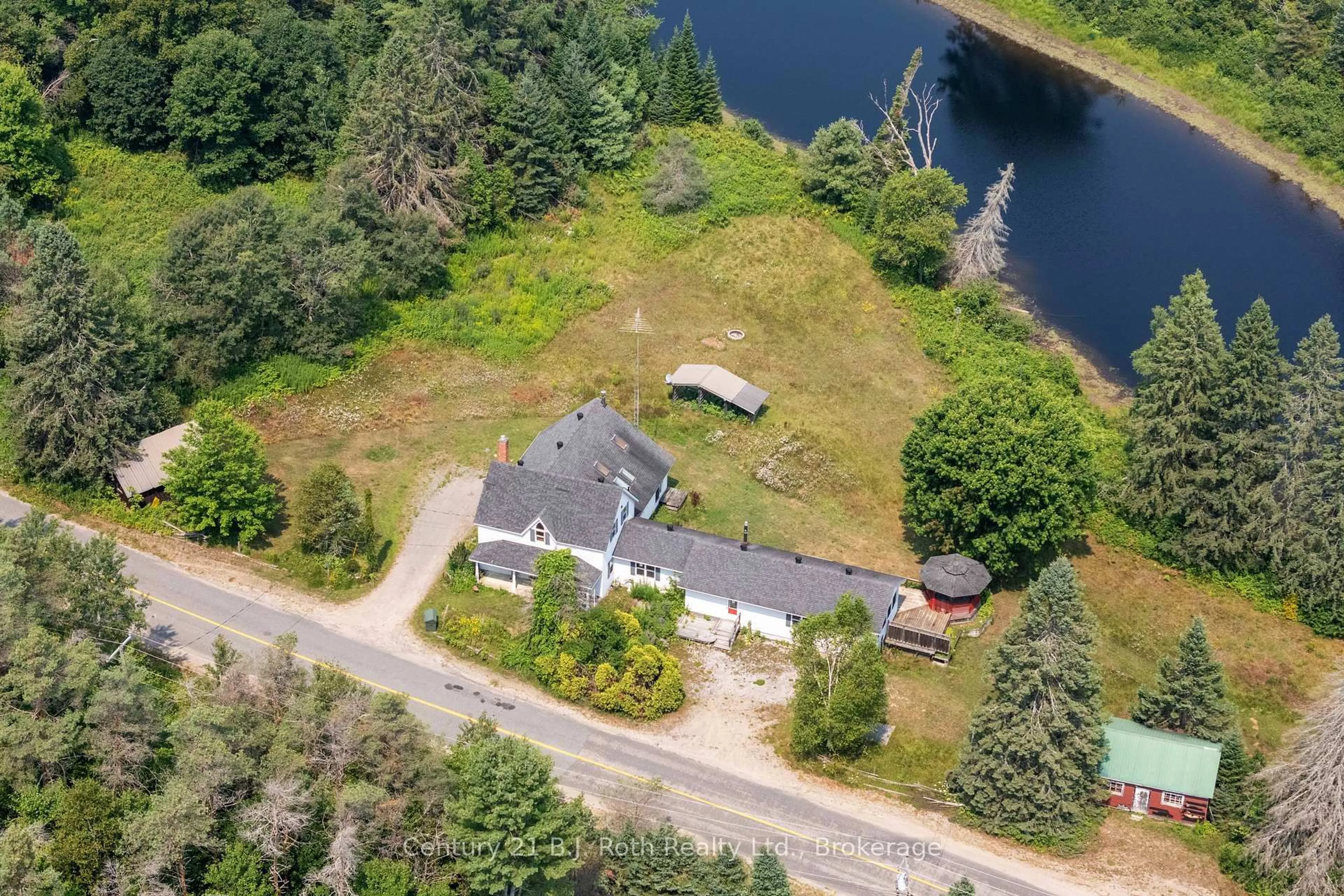 A pic from outside/outdoor area/front of a property/back of a property/a pic from drone, water/lake/river/ocean view for 2377 Fraserburg Rd, Lake of Bays Ontario P1L 1X3