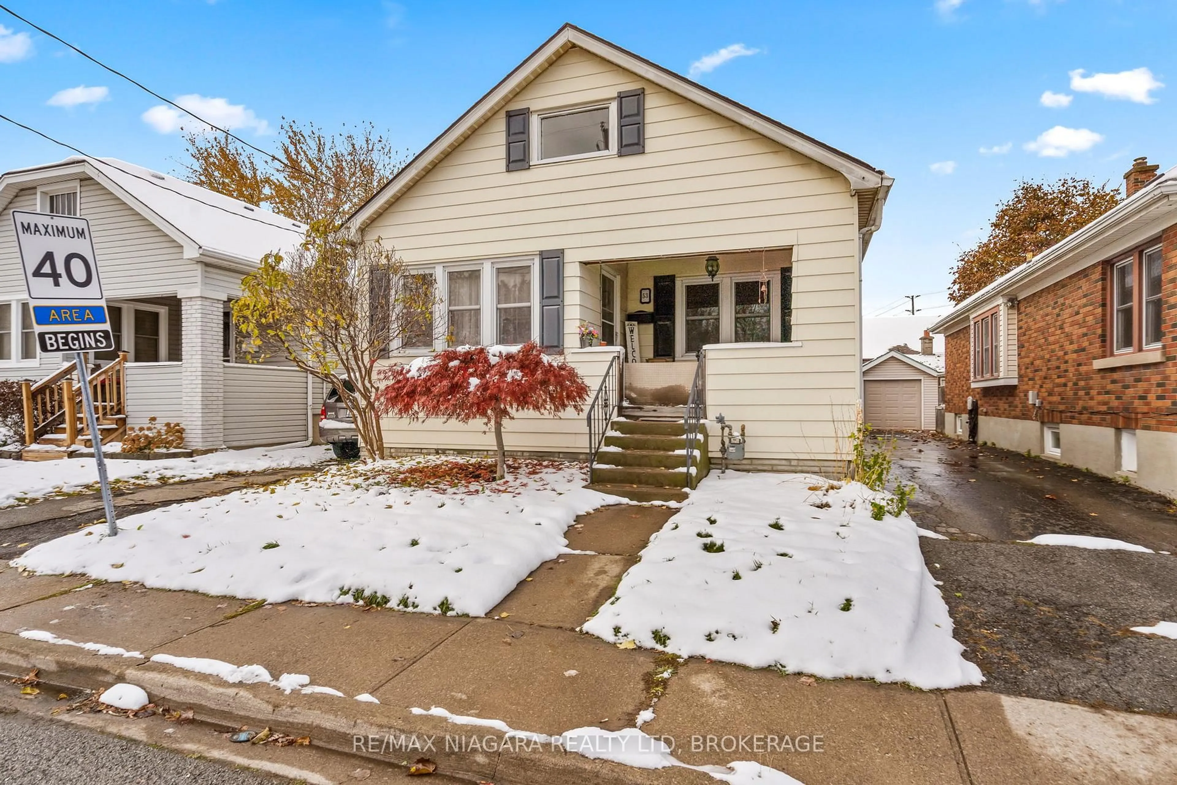 Home with vinyl exterior material, street for 53 Marquis St, St. Catharines Ontario L2R 4Y7