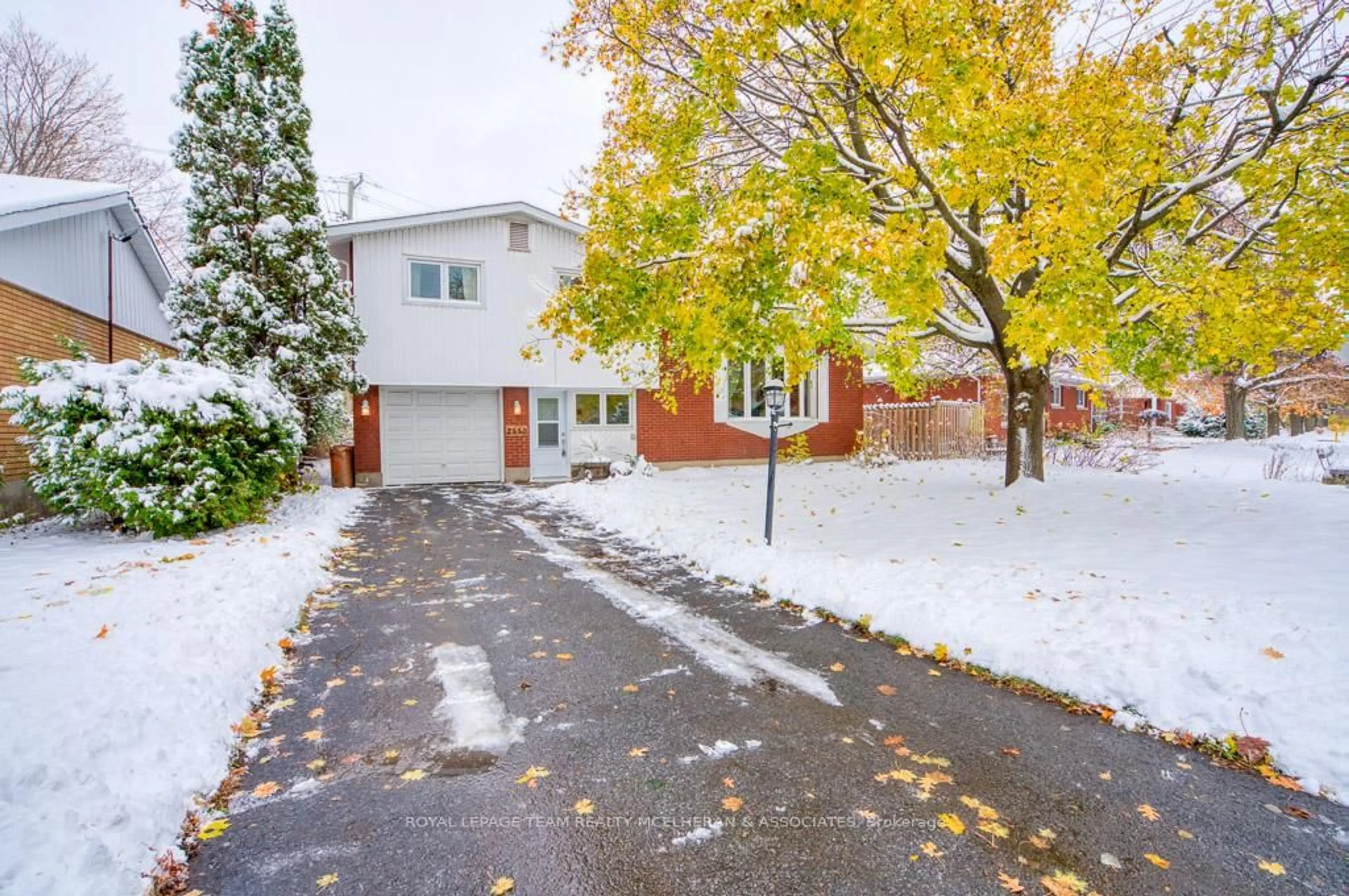 A pic from outside/outdoor area/front of a property/back of a property/a pic from drone, street for 2550 Iris St, Ottawa Ontario K2C 1E1