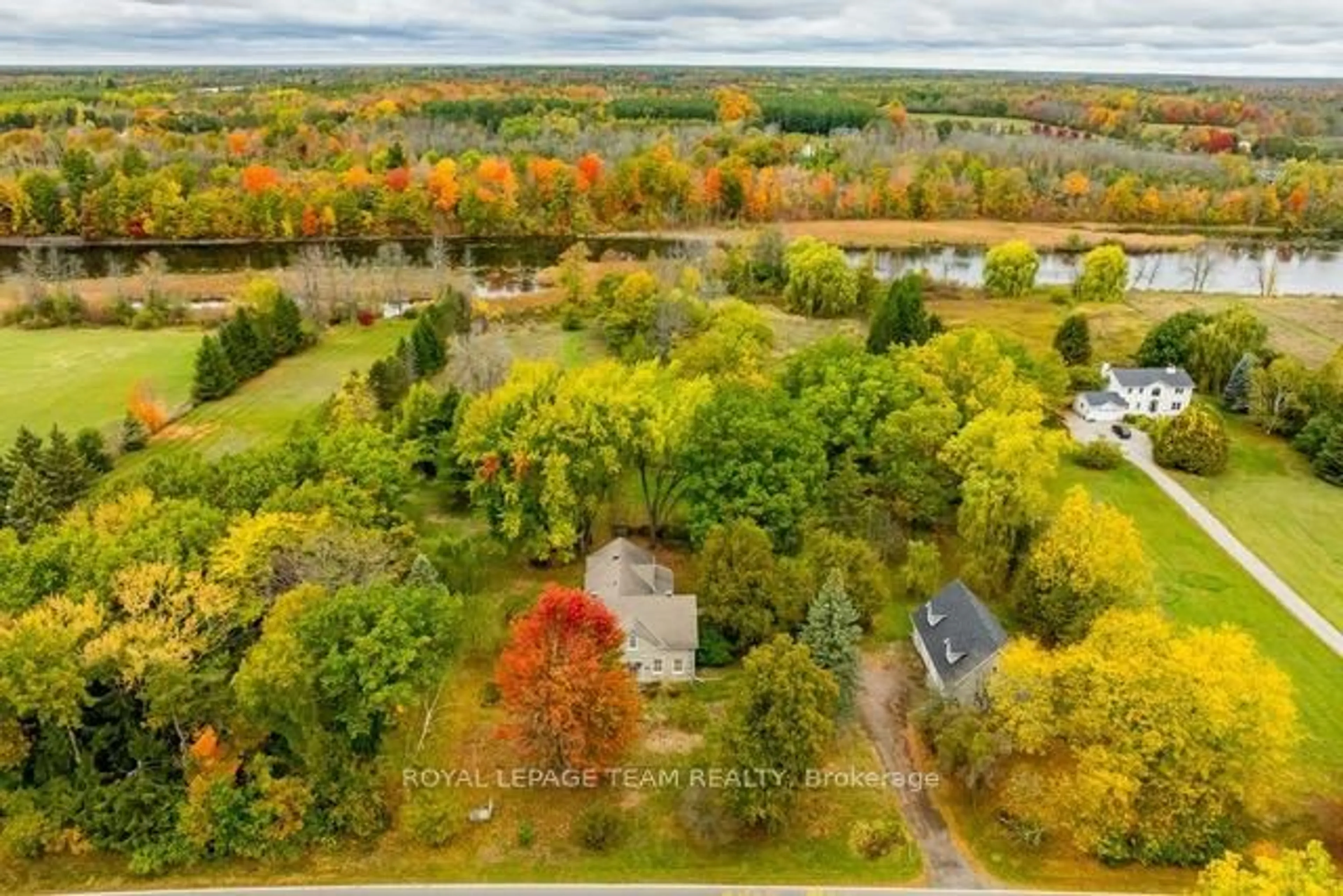 A pic from outside/outdoor area/front of a property/back of a property/a pic from drone, water/lake/river/ocean view for 3651 Burritts Rapids Rd, North Grenville Ontario K0G 1N0