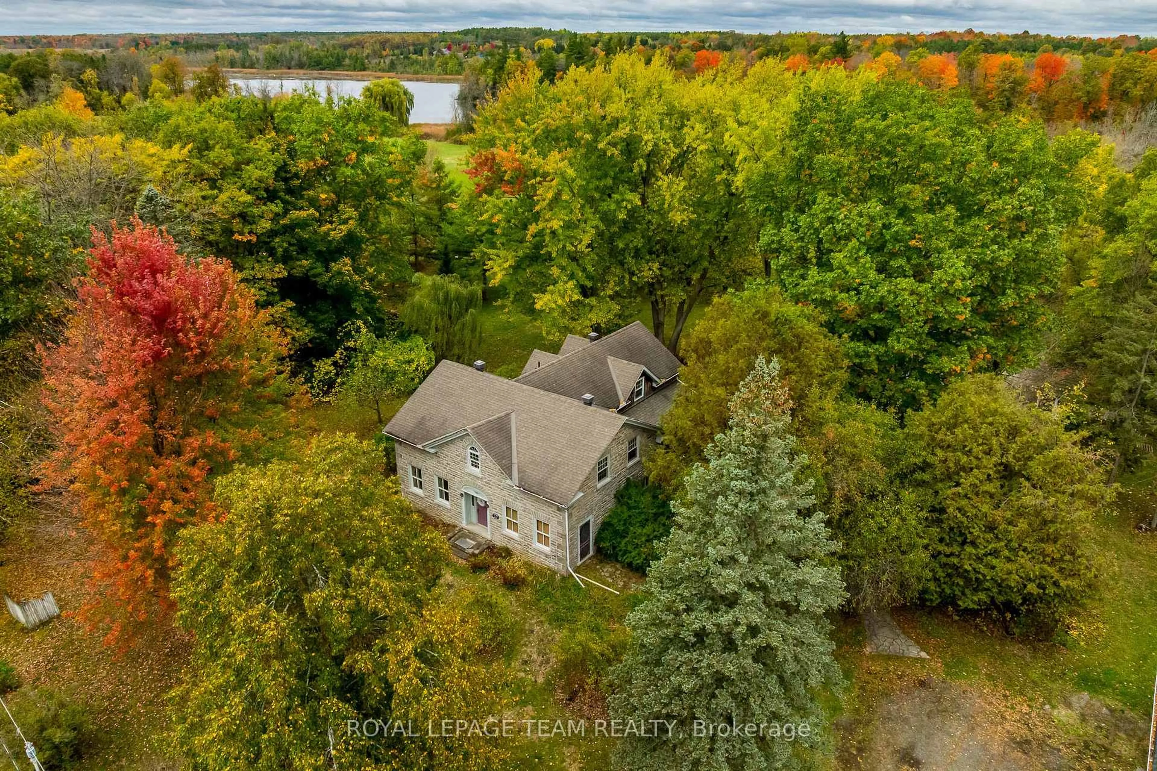 A pic from outside/outdoor area/front of a property/back of a property/a pic from drone, water/lake/river/ocean view for 3651 Burritts Rapids Rd, North Grenville Ontario K0G 1N0
