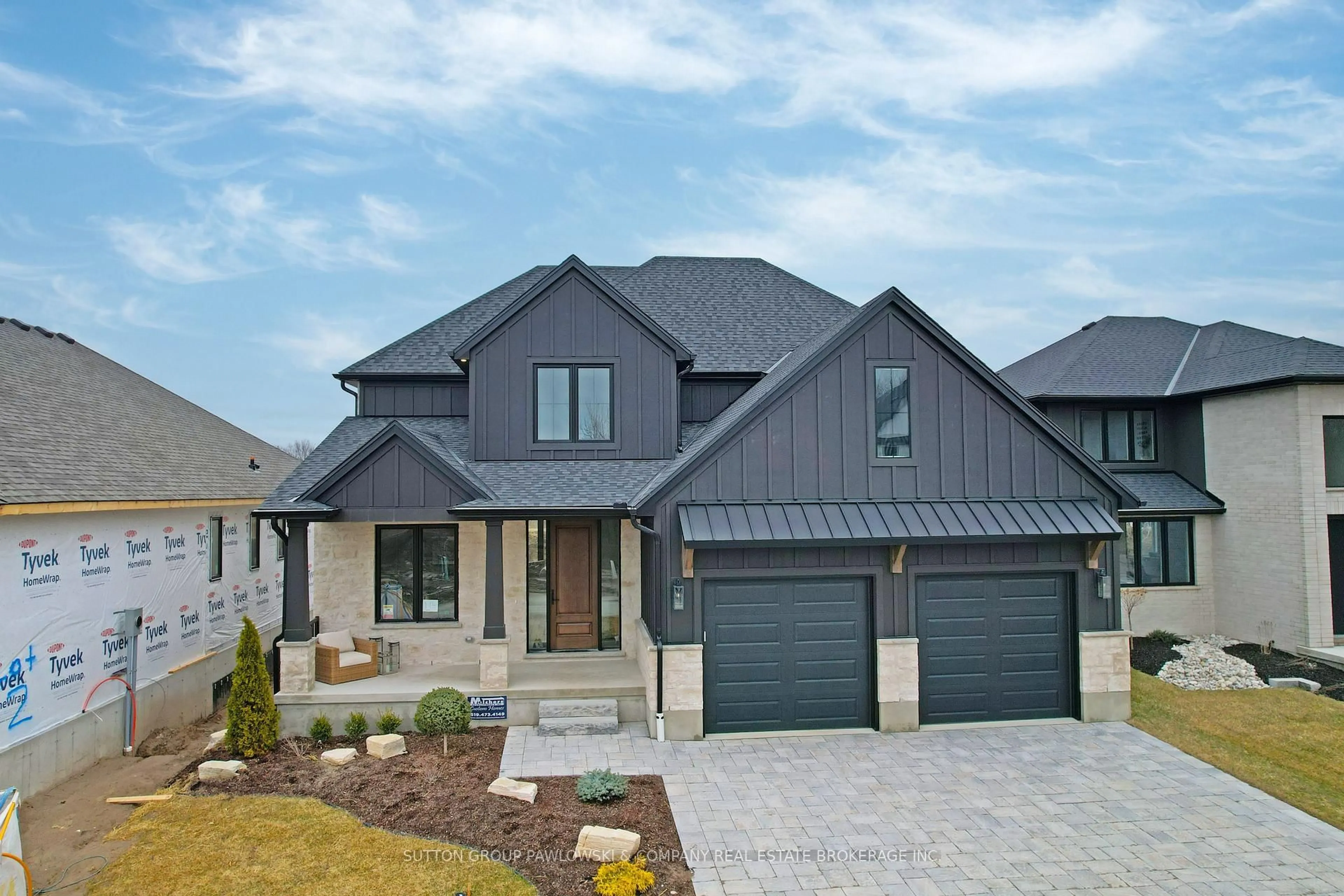 Home with brick exterior material, street for 111 TIMBERWALK Tr #LOT #44, Middlesex Centre Ontario N0M 2A0