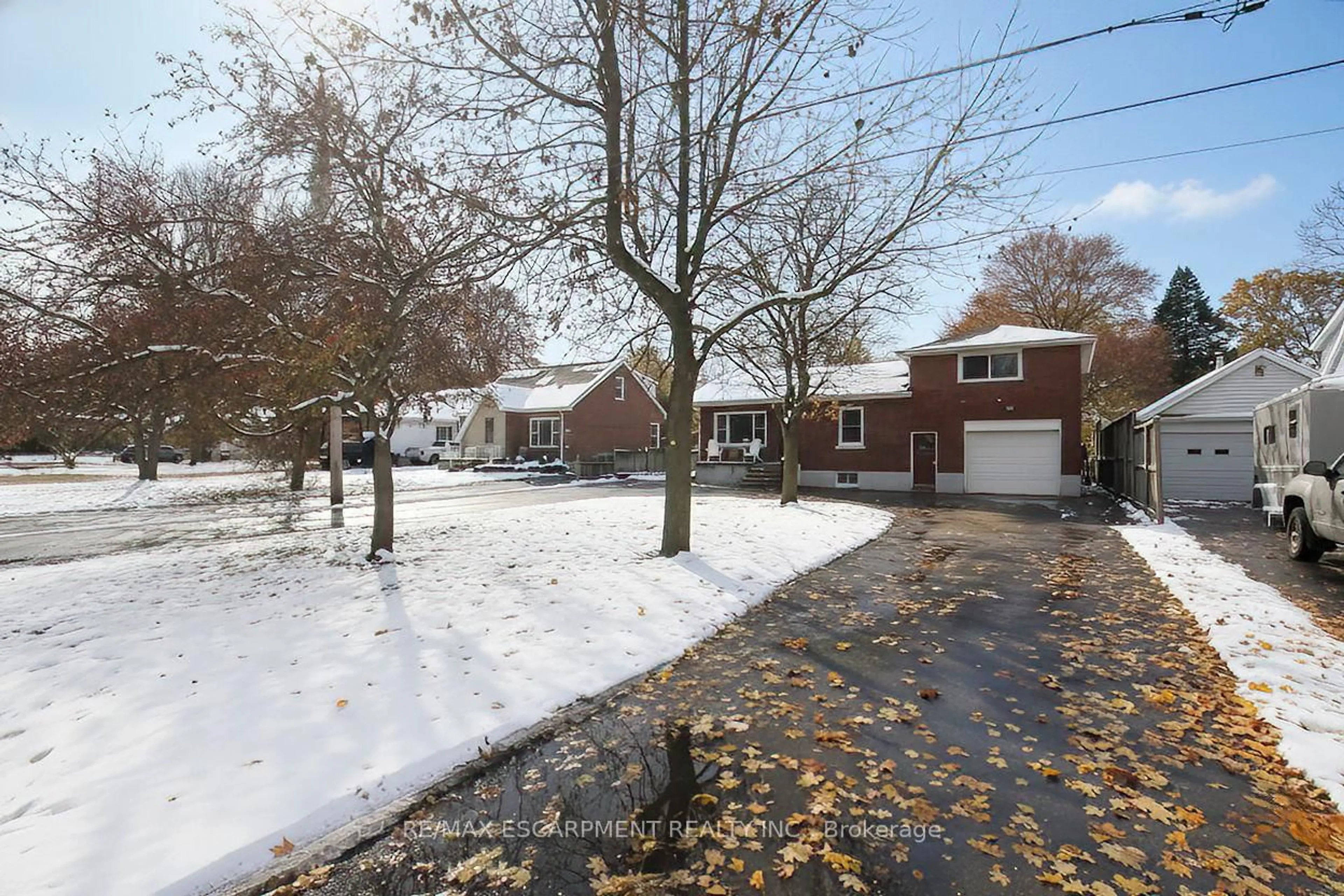 A pic from outside/outdoor area/front of a property/back of a property/a pic from drone, street for 67 Blossom Ave, Brantford Ontario N3T 5L9