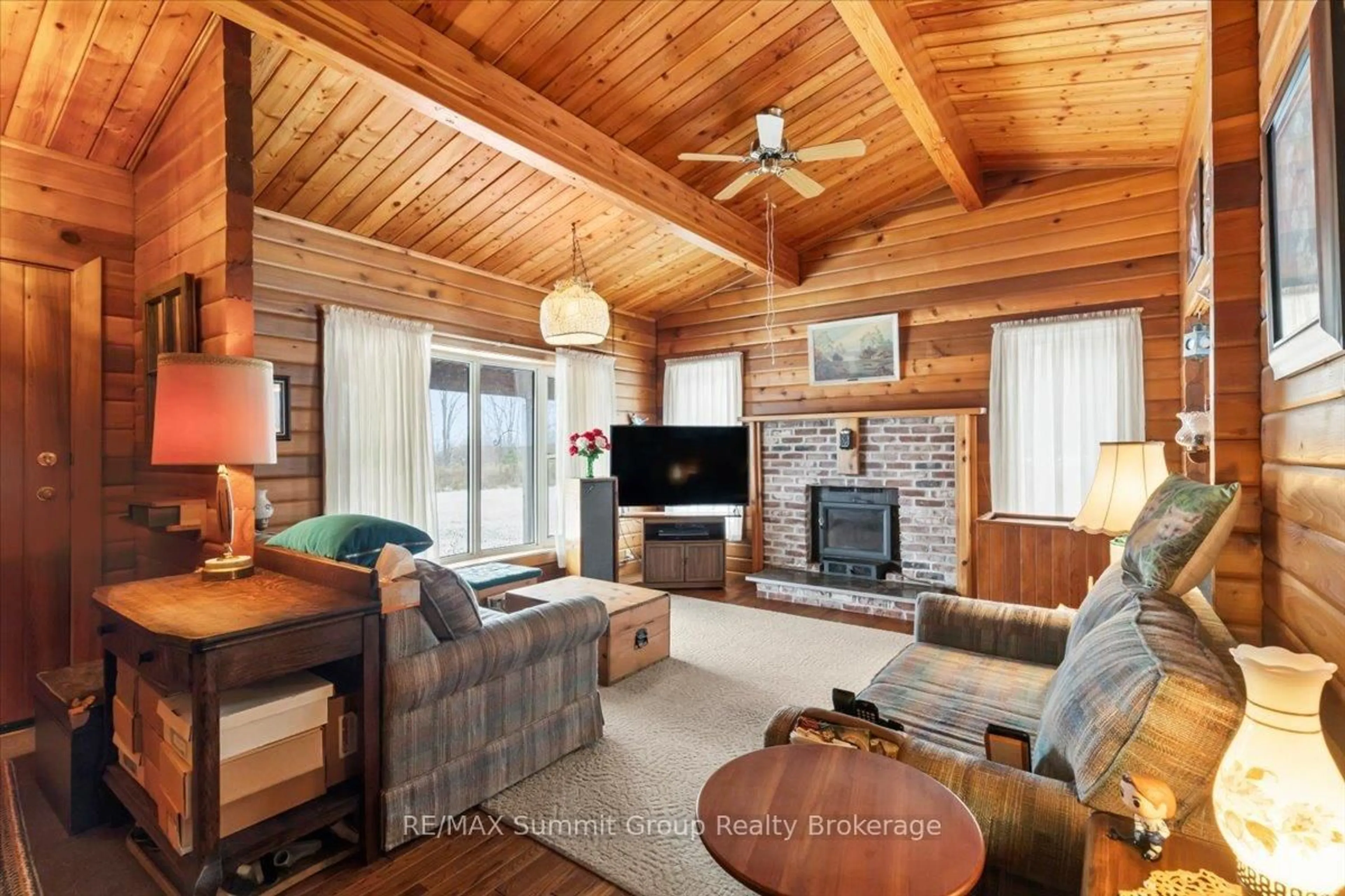 Living room with furniture, wood/laminate floor for 263733 Southgate Road 26, Southgate Ontario N0G 1R0