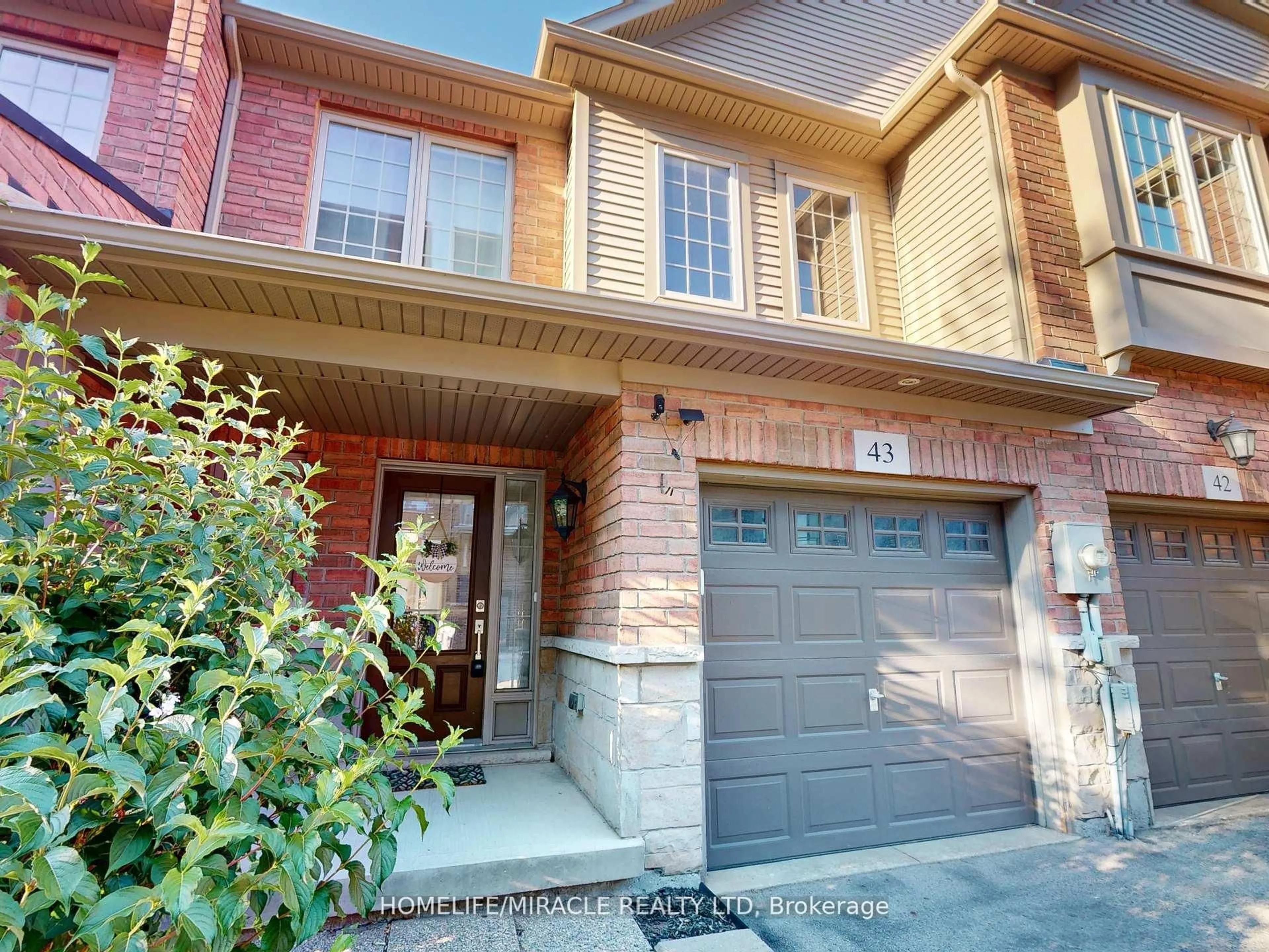 Home with brick exterior material, street for 515 Winston Rd #43, Grimsby Ontario L3M 0C8