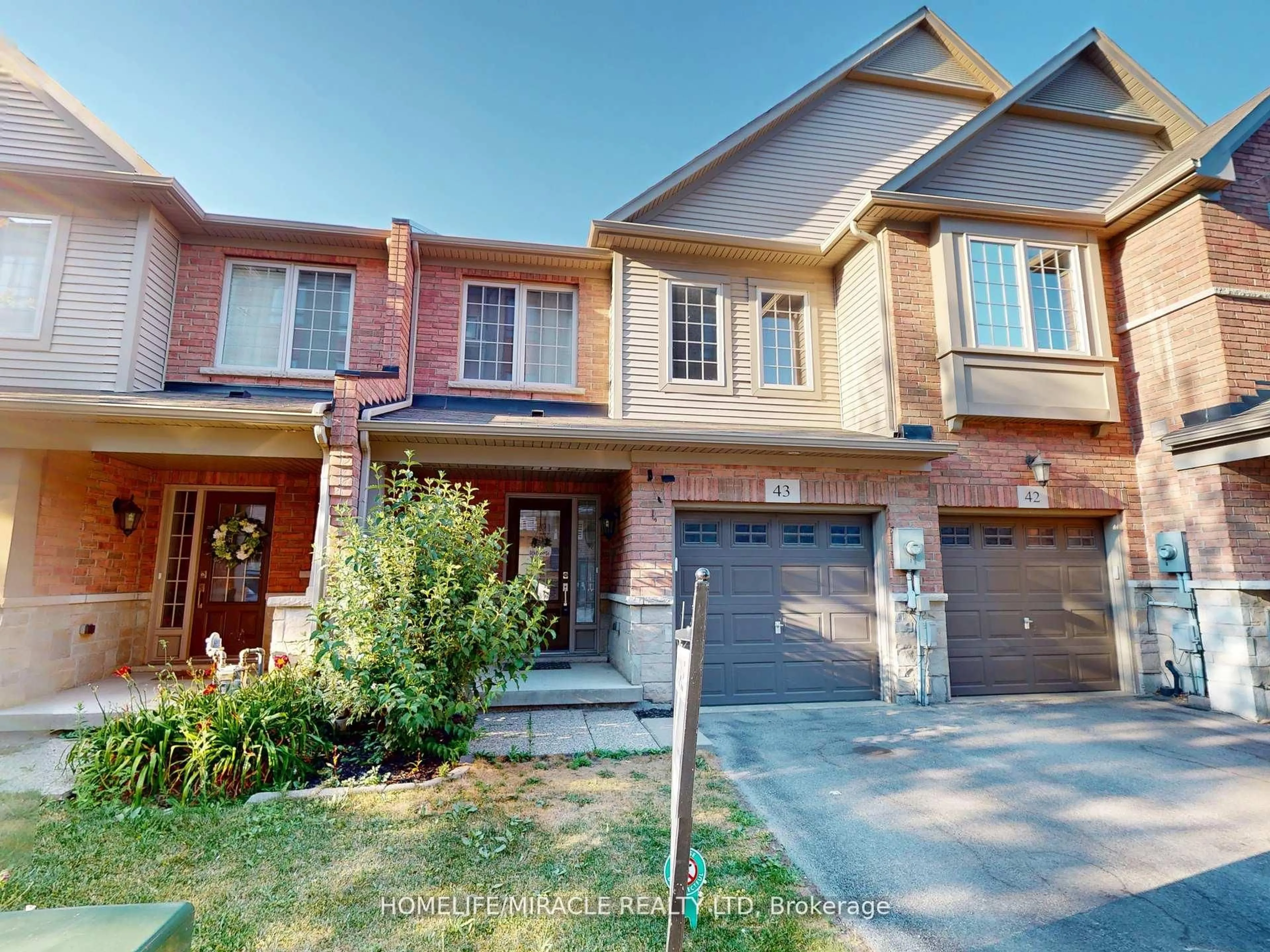 Home with brick exterior material, street for 515 Winston Rd #43, Grimsby Ontario L3M 0C8