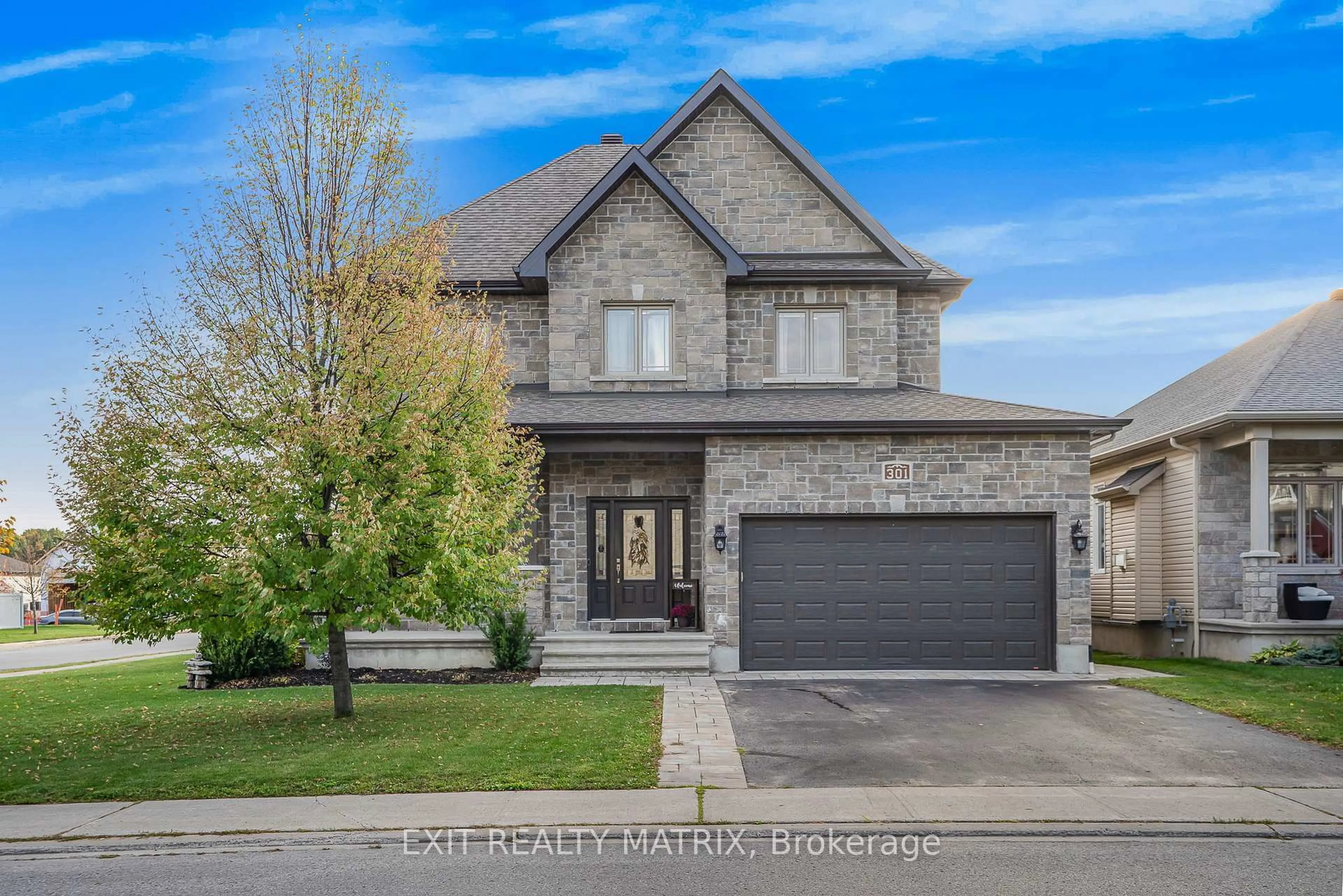 Home with brick exterior material, street for 301 Colmar St, Russell Ontario K0A 1W0