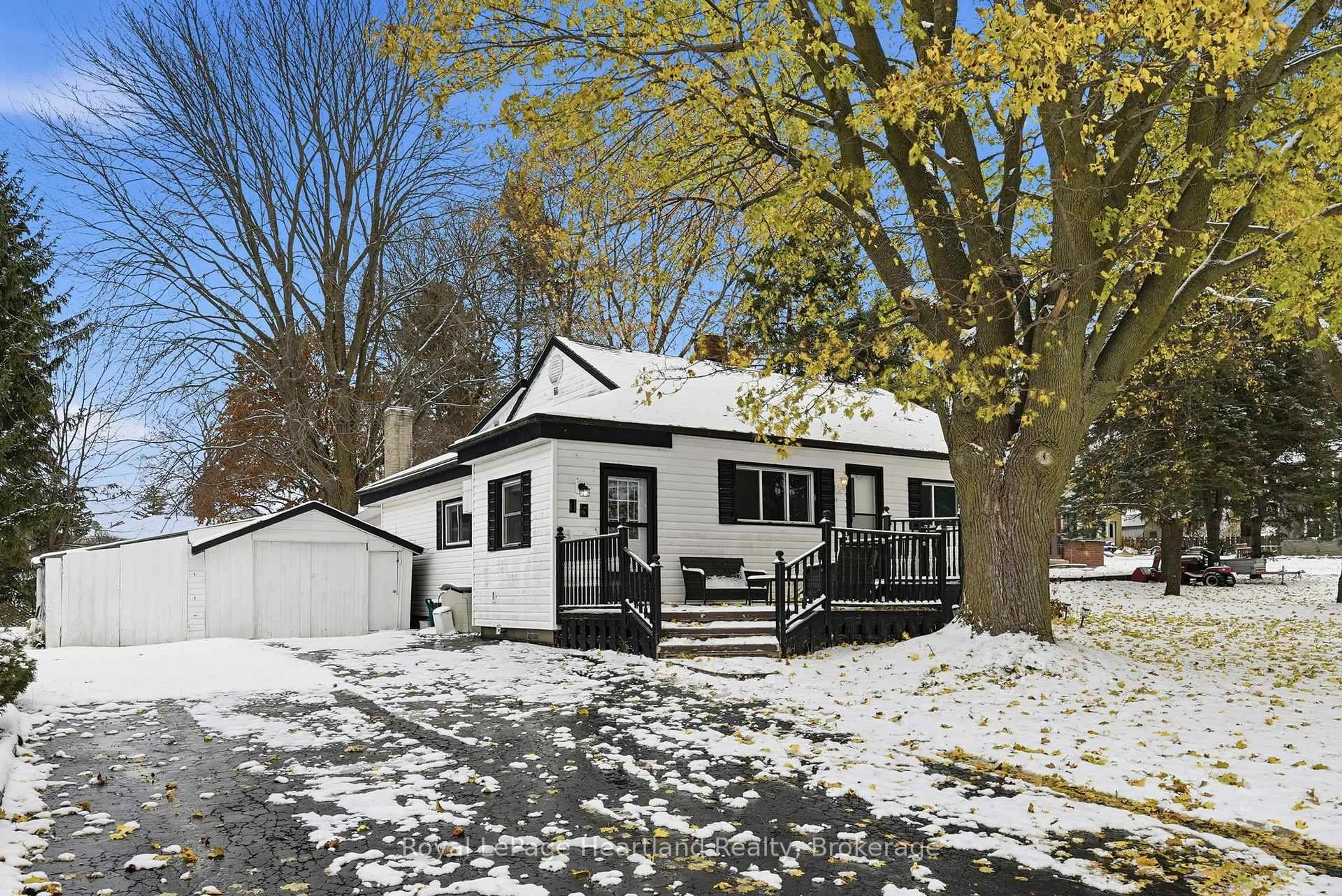 Home with vinyl exterior material, street for 15 Wilson St, Minto Ontario N0G 1Z0