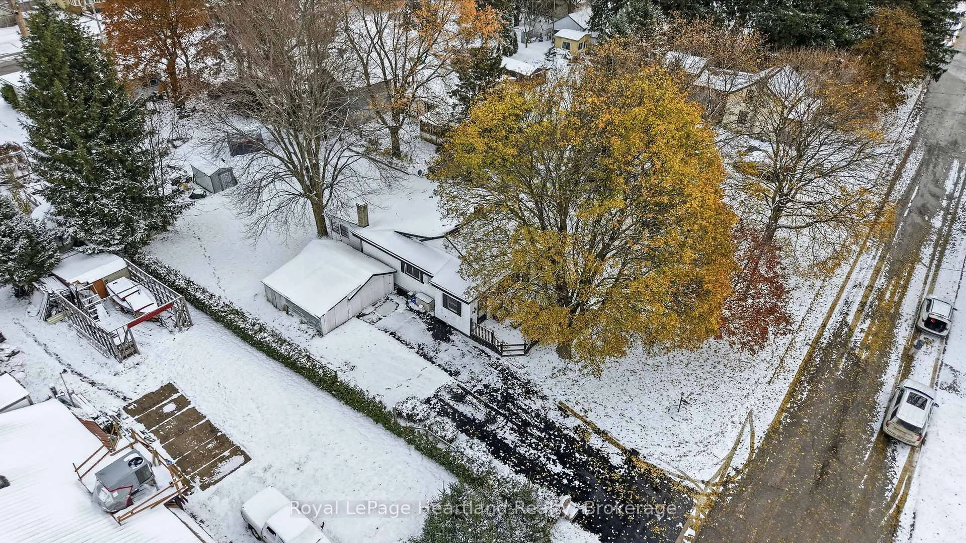 A pic from outside/outdoor area/front of a property/back of a property/a pic from drone, street for 15 Wilson St, Minto Ontario N0G 1Z0