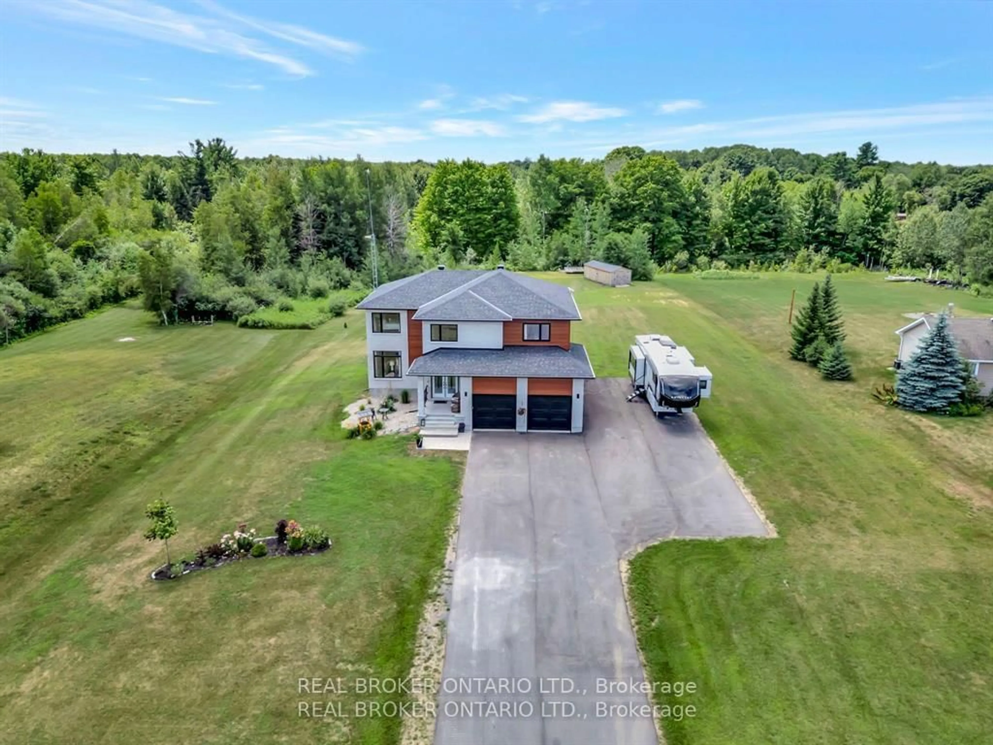 A pic from outside/outdoor area/front of a property/back of a property/a pic from drone, water/lake/river/ocean view for 114 Smith Rd, North Grenville Ontario K0G 1T0