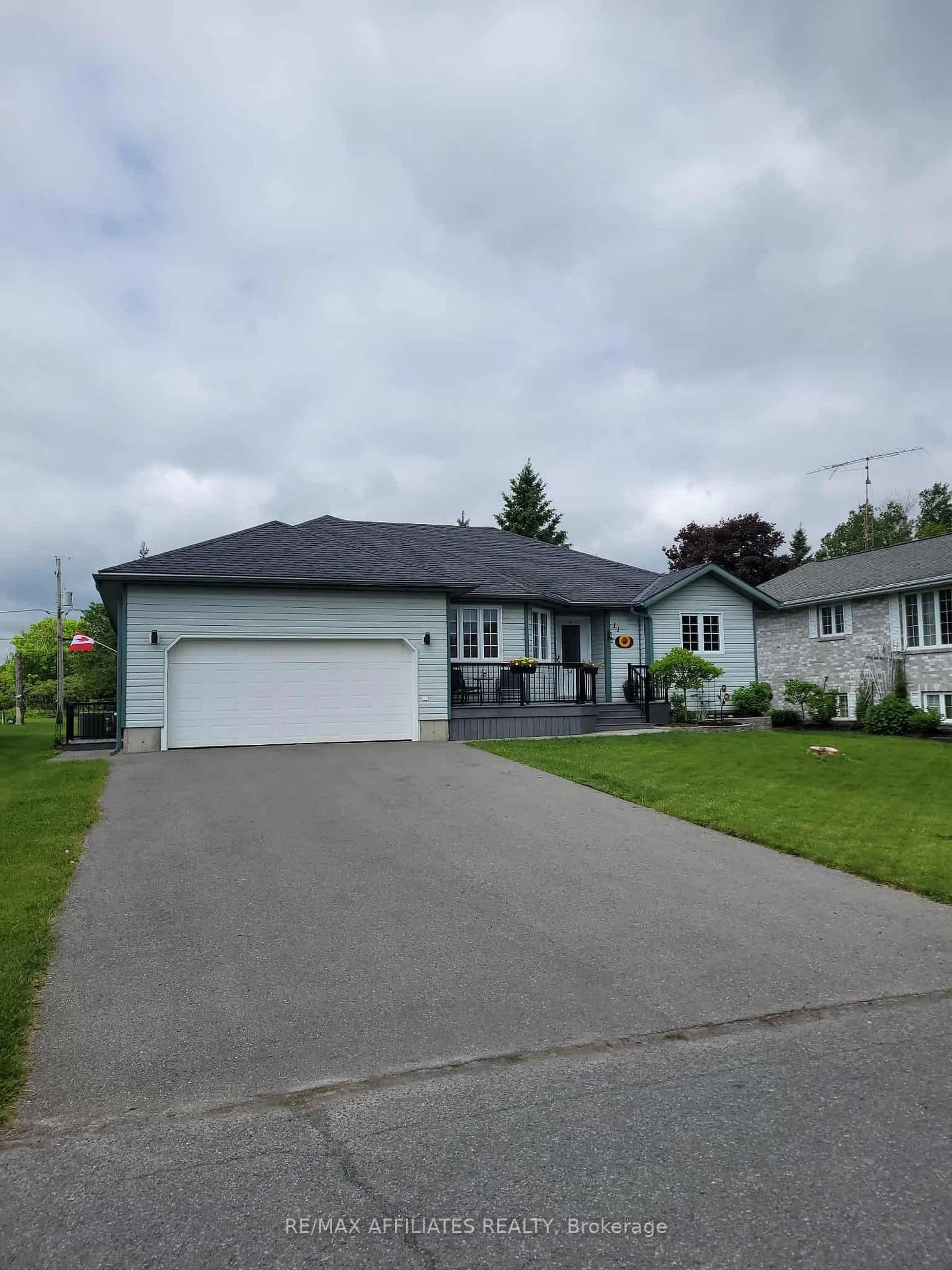 Home with vinyl exterior material, street for 11 Grove St, South Dundas Ontario K0E 1K0