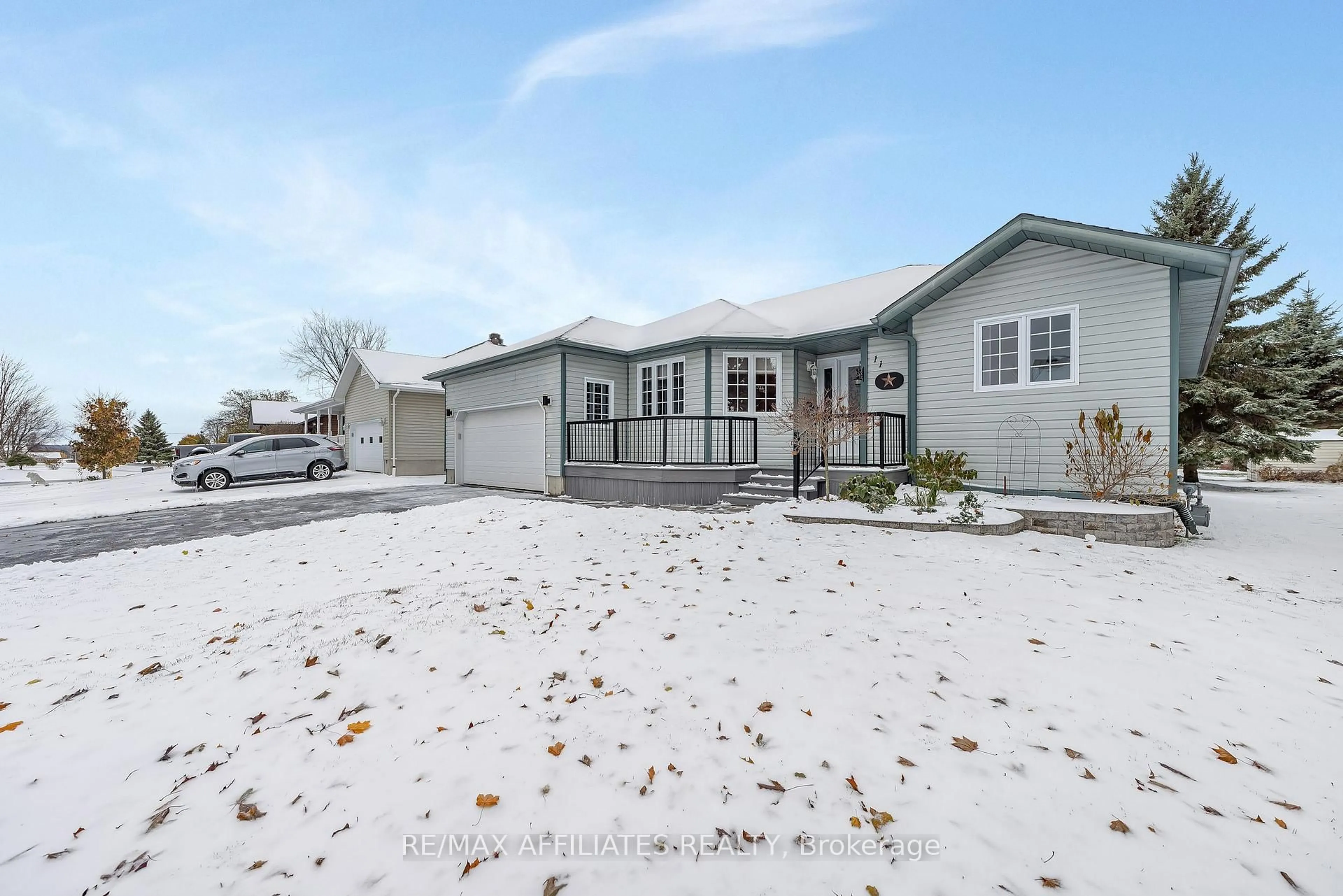 Home with vinyl exterior material, street for 11 Grove St, South Dundas Ontario K0E 1K0