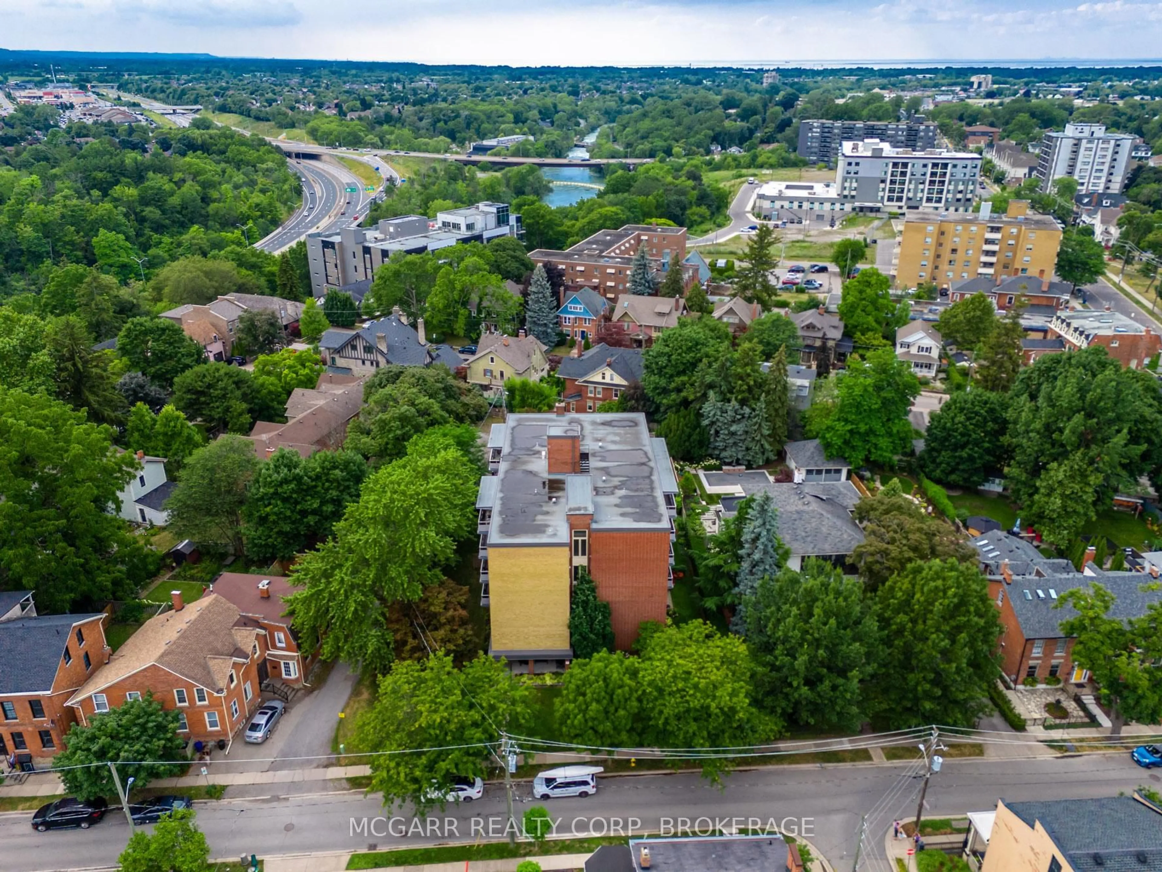 A pic from outside/outdoor area/front of a property/back of a property/a pic from drone, city buildings view from balcony for 14 Norris Pl #503, St. Catharines Ontario L2R 2W8