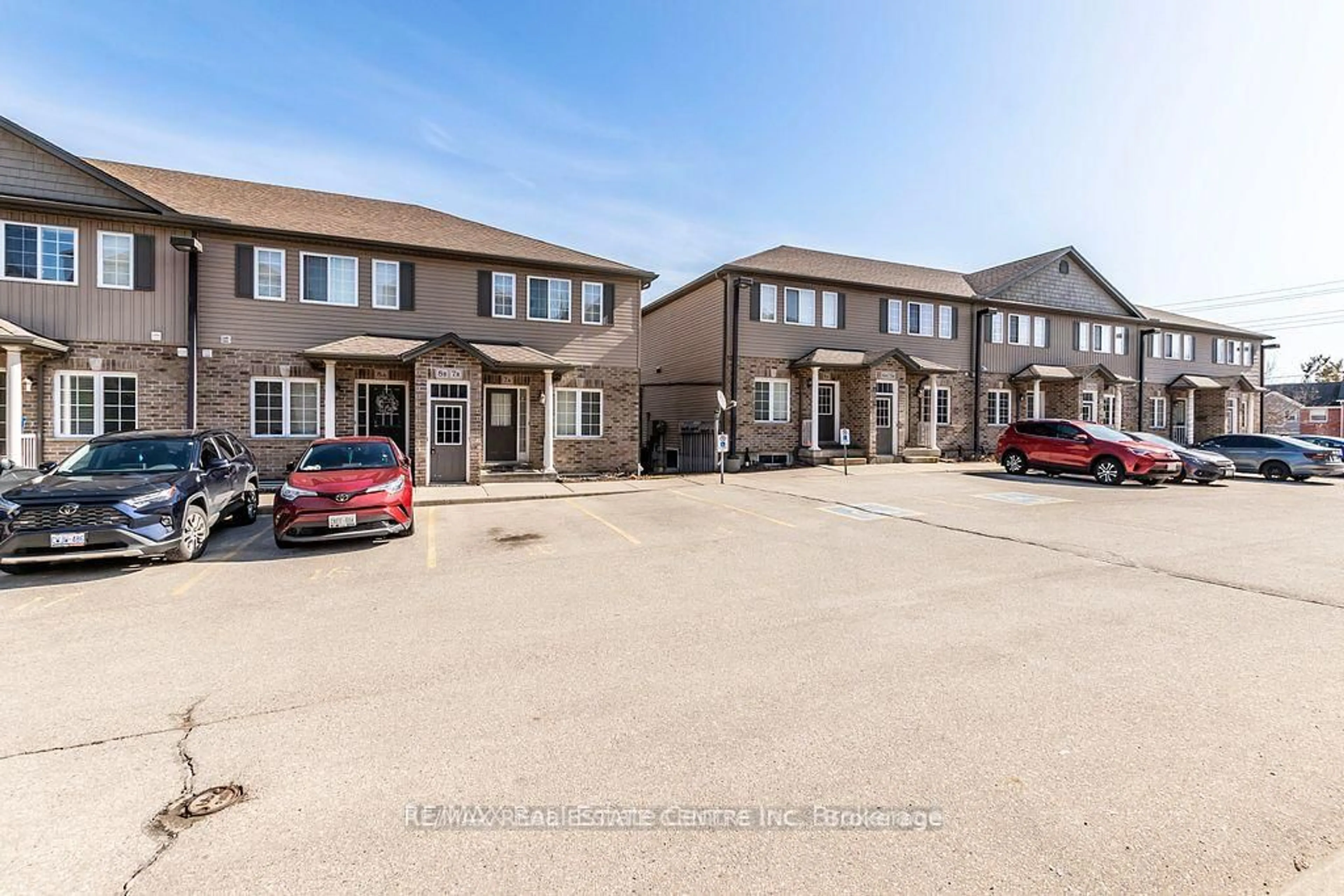 A pic from outside/outdoor area/front of a property/back of a property/a pic from drone, street for 38 Howe Dr #8B, Kitchener Ontario N2E 0E3