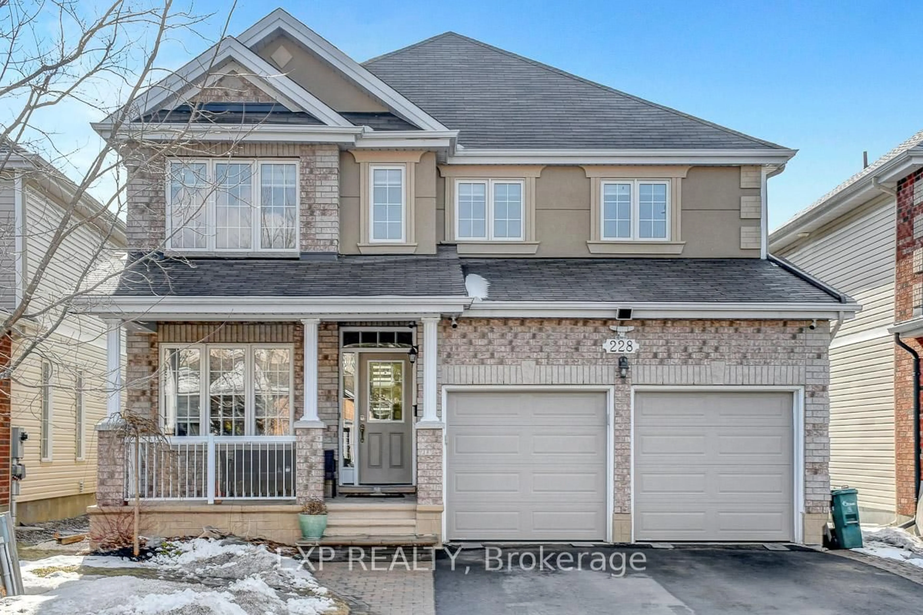 Home with brick exterior material, street for 228 Hidden Meadow Ave, Ottawa Ontario K1T 0C2