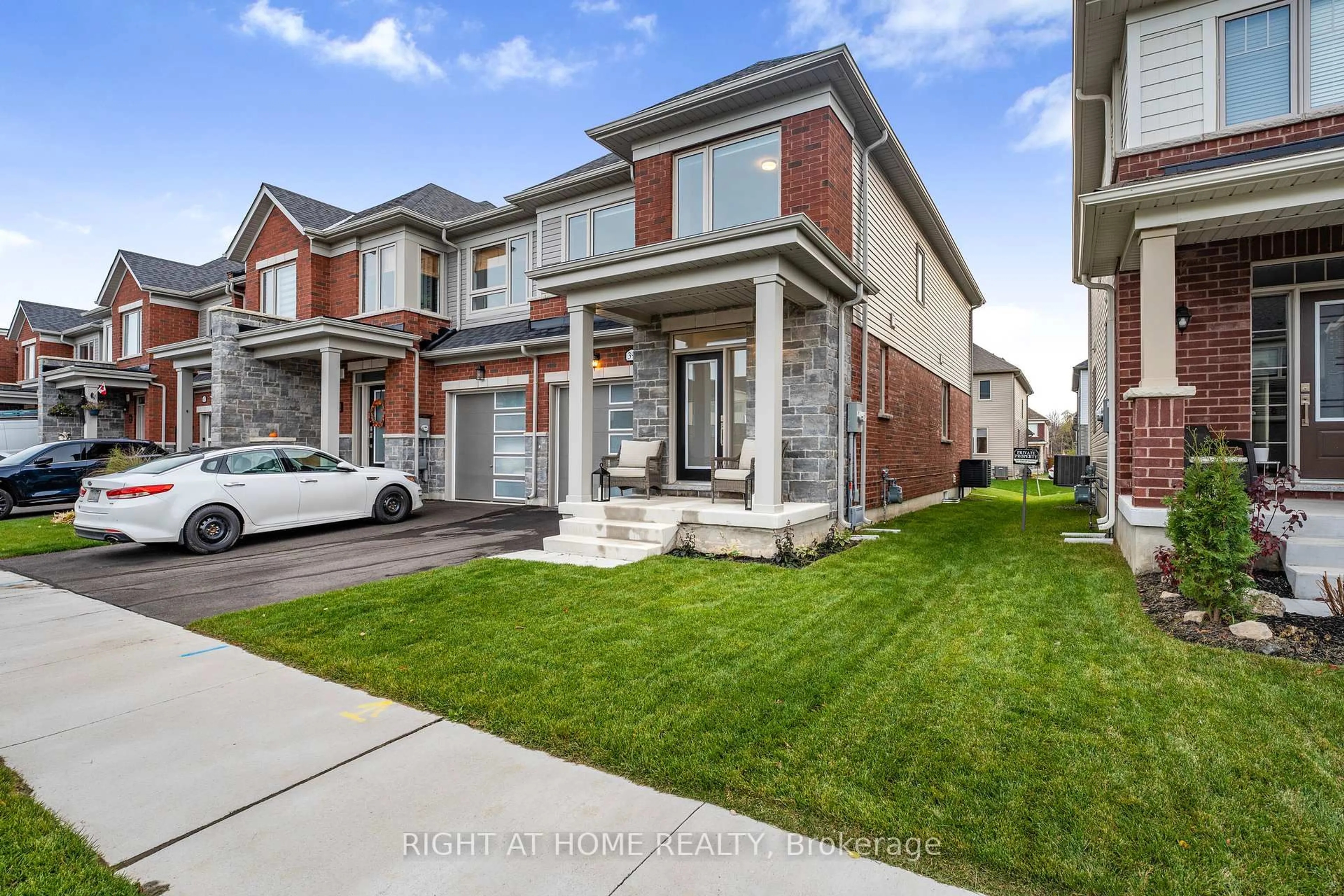 Home with brick exterior material, street for 39 Edminston Dr, Centre Wellington Ontario N1M 0J1