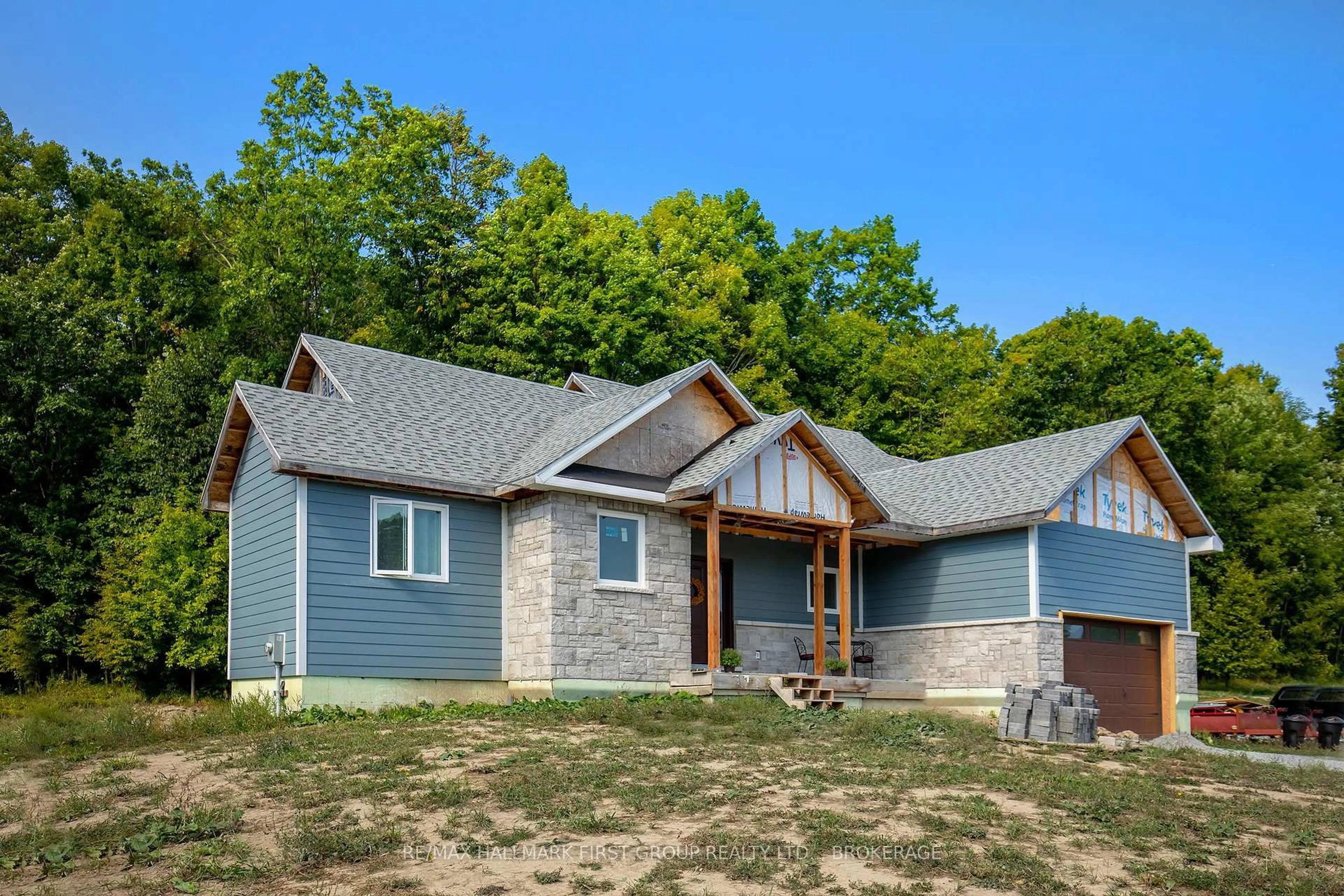 Home with vinyl exterior material, building for 1054 Cranberry Cove Lane, Seeley's Bay Ontario K0H 2N0
