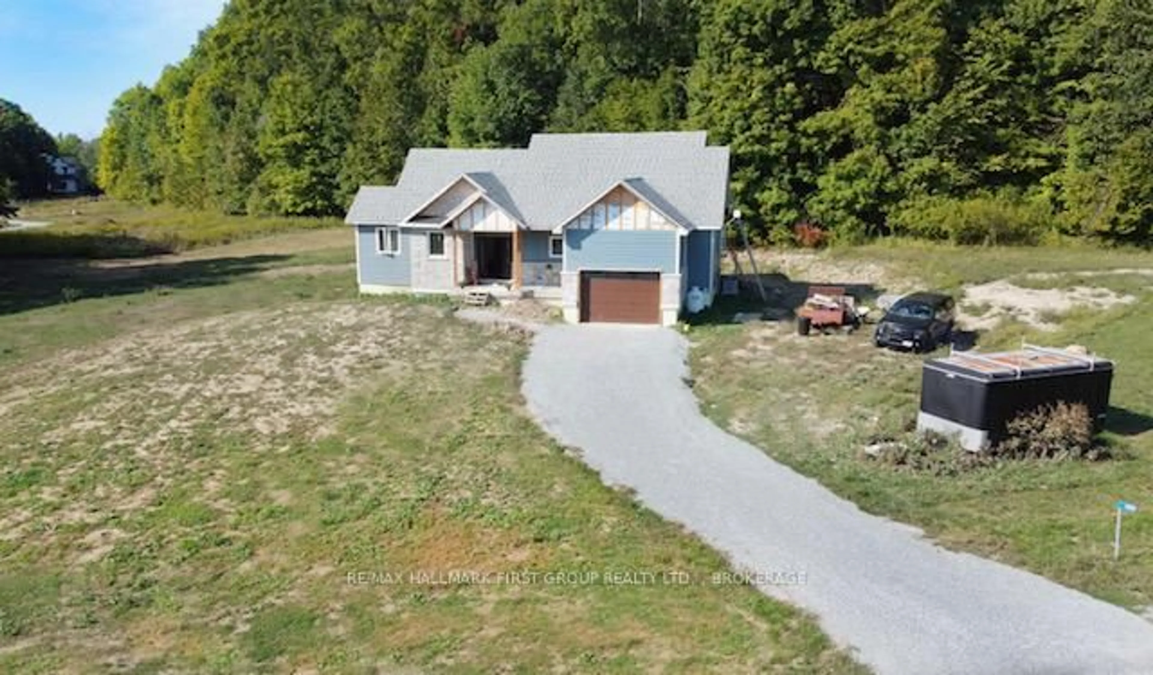 A pic from outside/outdoor area/front of a property/back of a property/a pic from drone, street for 1054 Cranberry Cove Lane, Seeley's Bay Ontario K0H 2N0